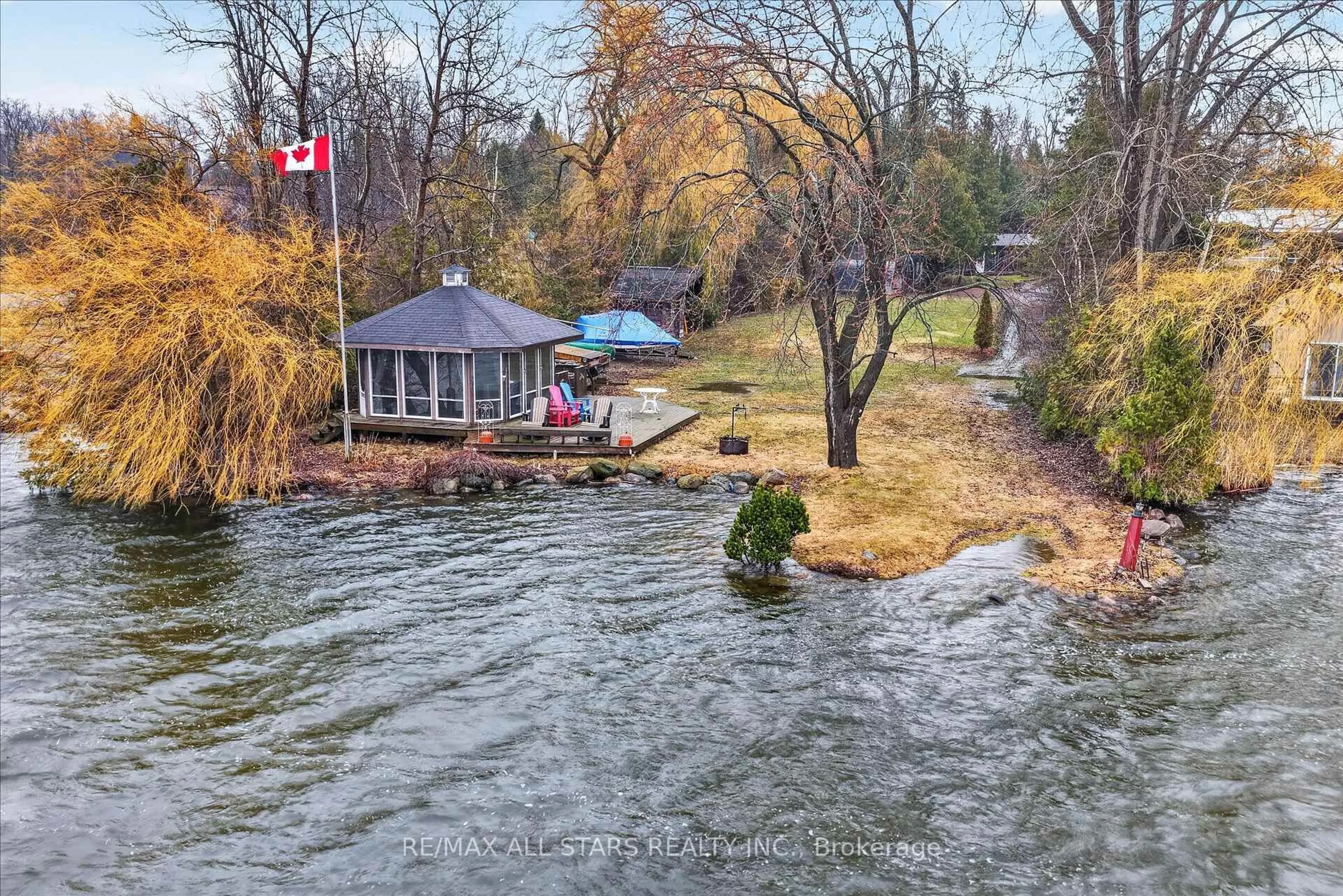 A pic from outside/outdoor area/front of a property/back of a property/a pic from drone, water/lake/river/ocean view for 41 Cedar Cres, Kawartha Lakes Ontario L0B 1K0