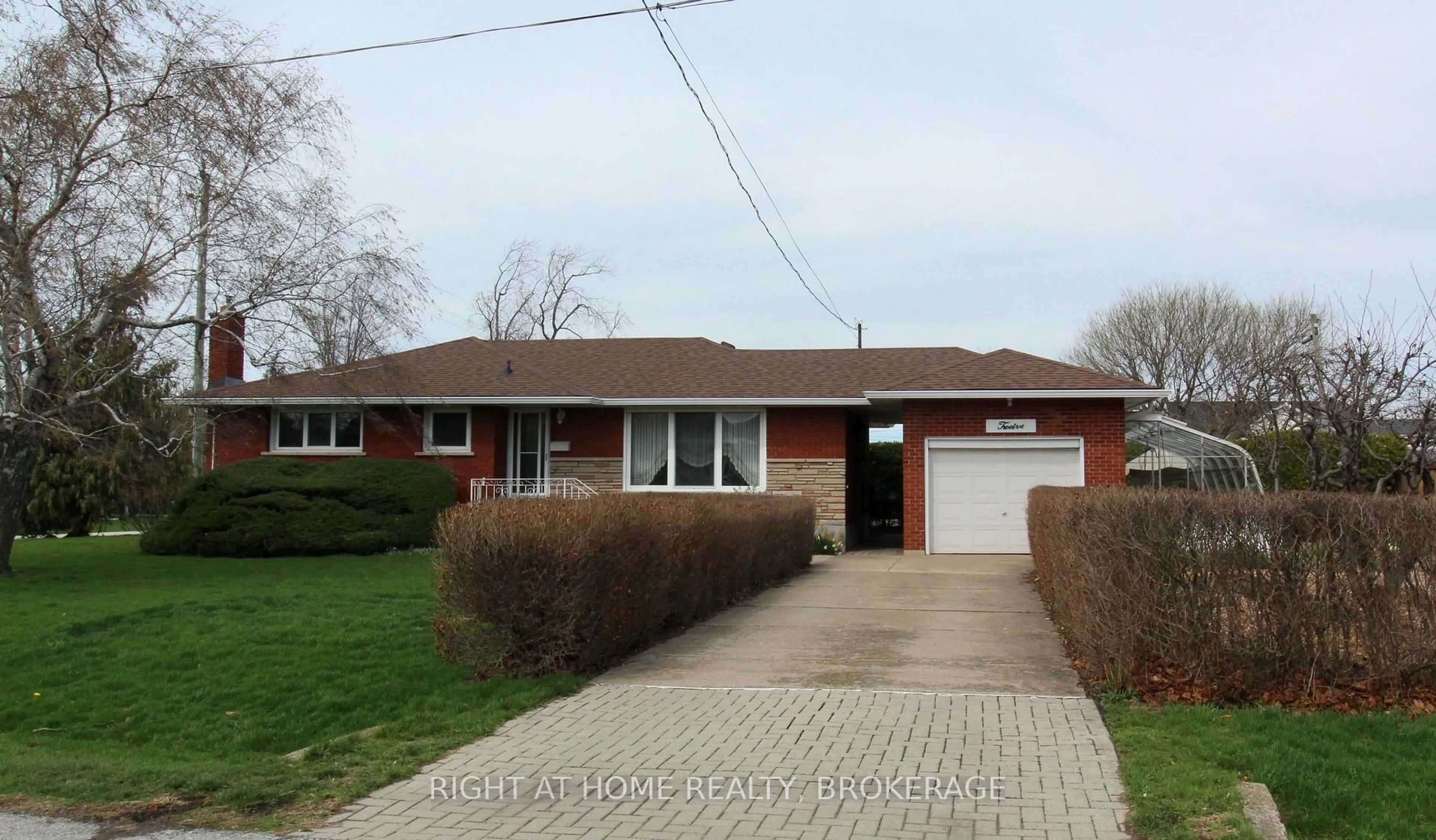 Home with brick exterior material, street for 12 Lorne Ave, Grimsby Ontario L3M 2H5
