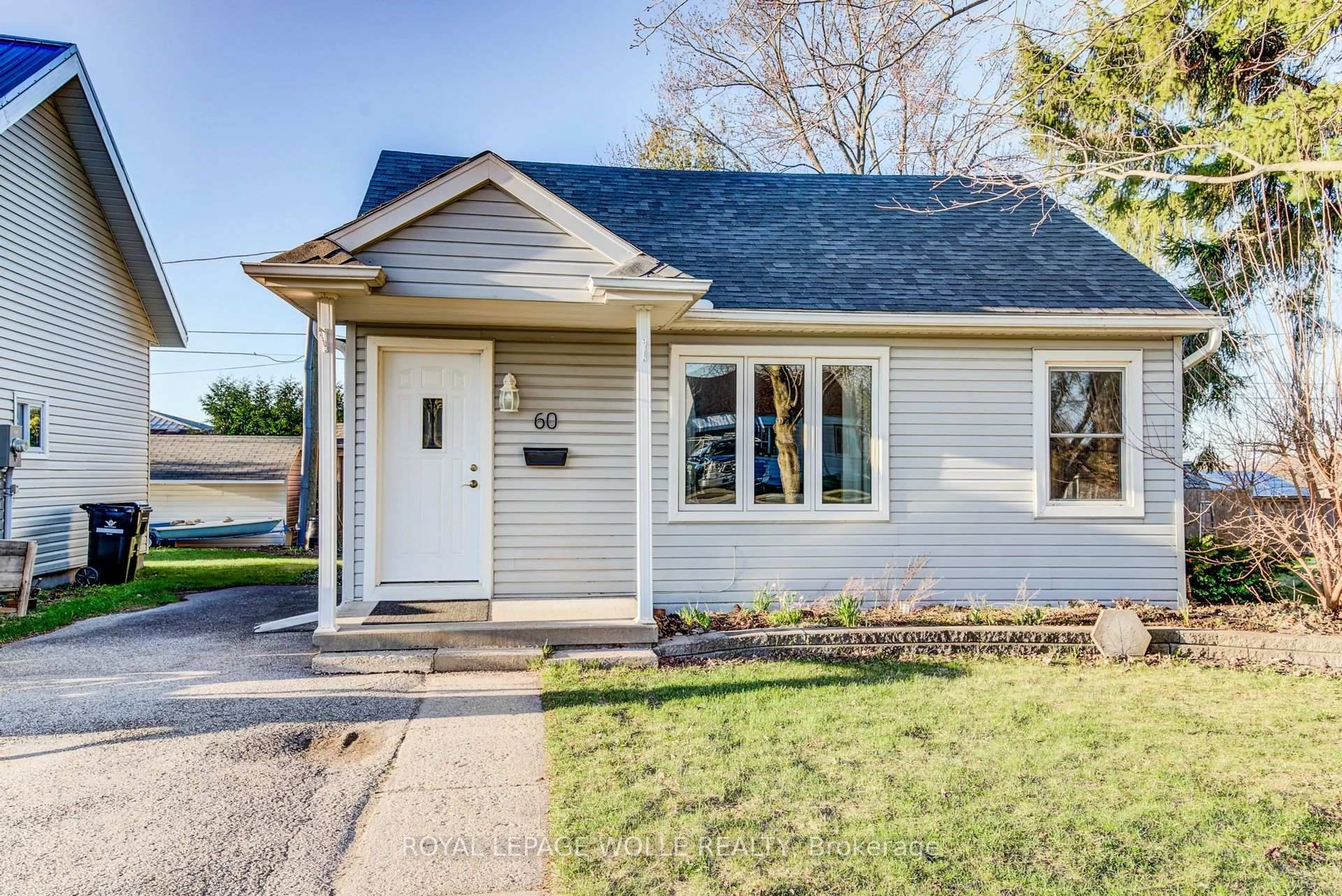 Home with vinyl exterior material, street for 60 Riverside Dr, Woolwich Ontario N3B 1R8