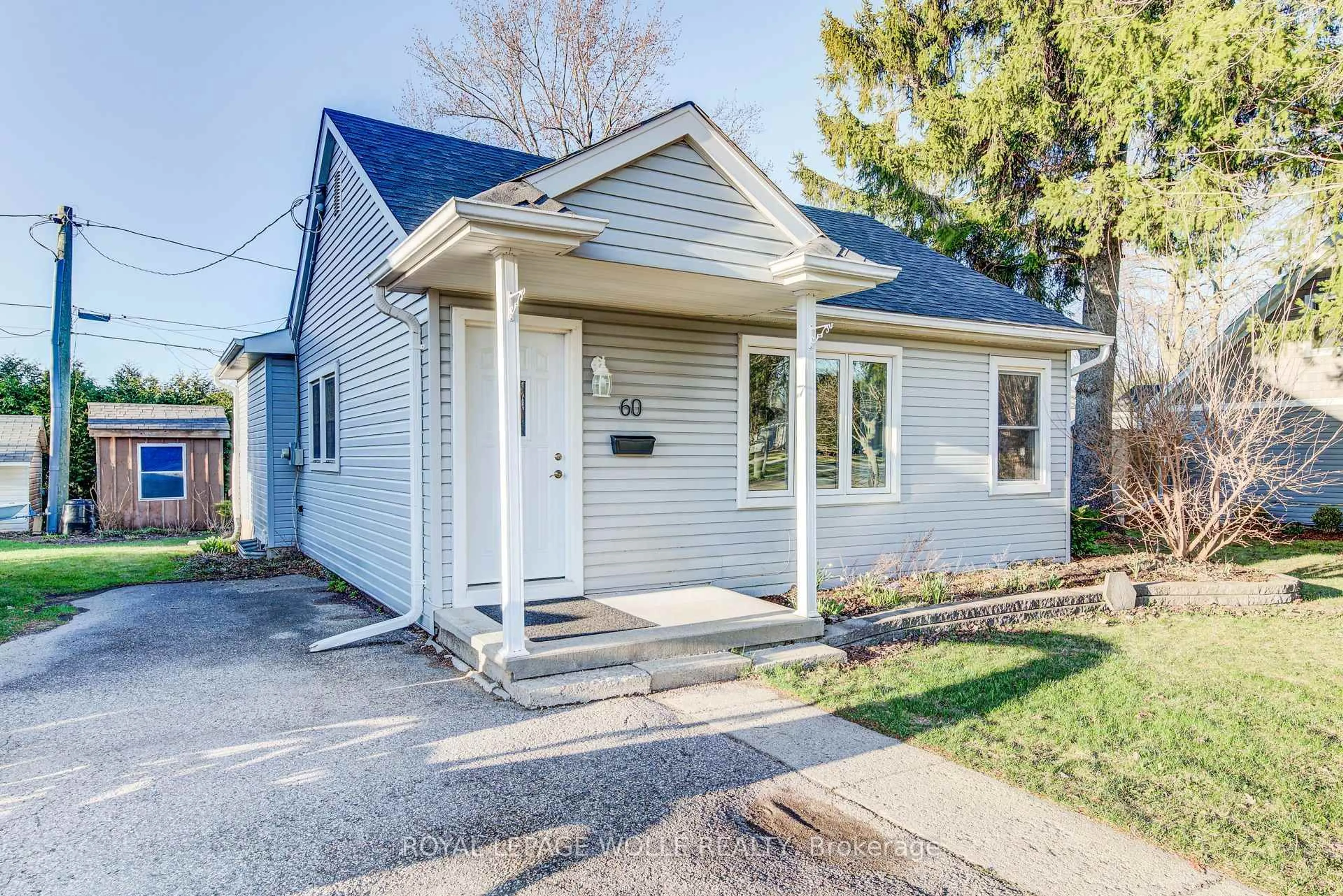 Home with vinyl exterior material, street for 60 Riverside Dr, Woolwich Ontario N3B 1R8