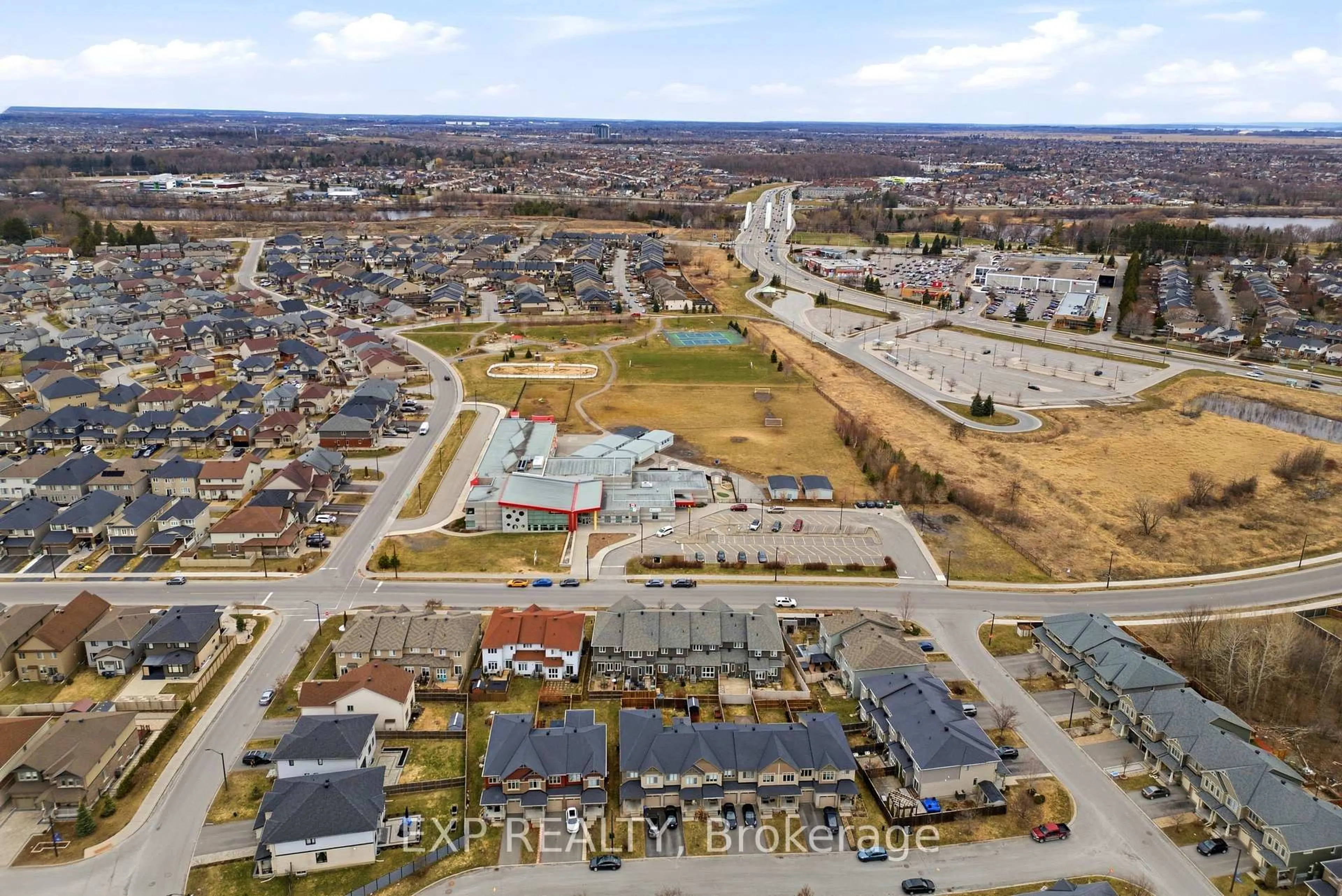 A pic from outside/outdoor area/front of a property/back of a property/a pic from drone, street for 710 Brian Good Ave, Ottawa Ontario K4M 0C1