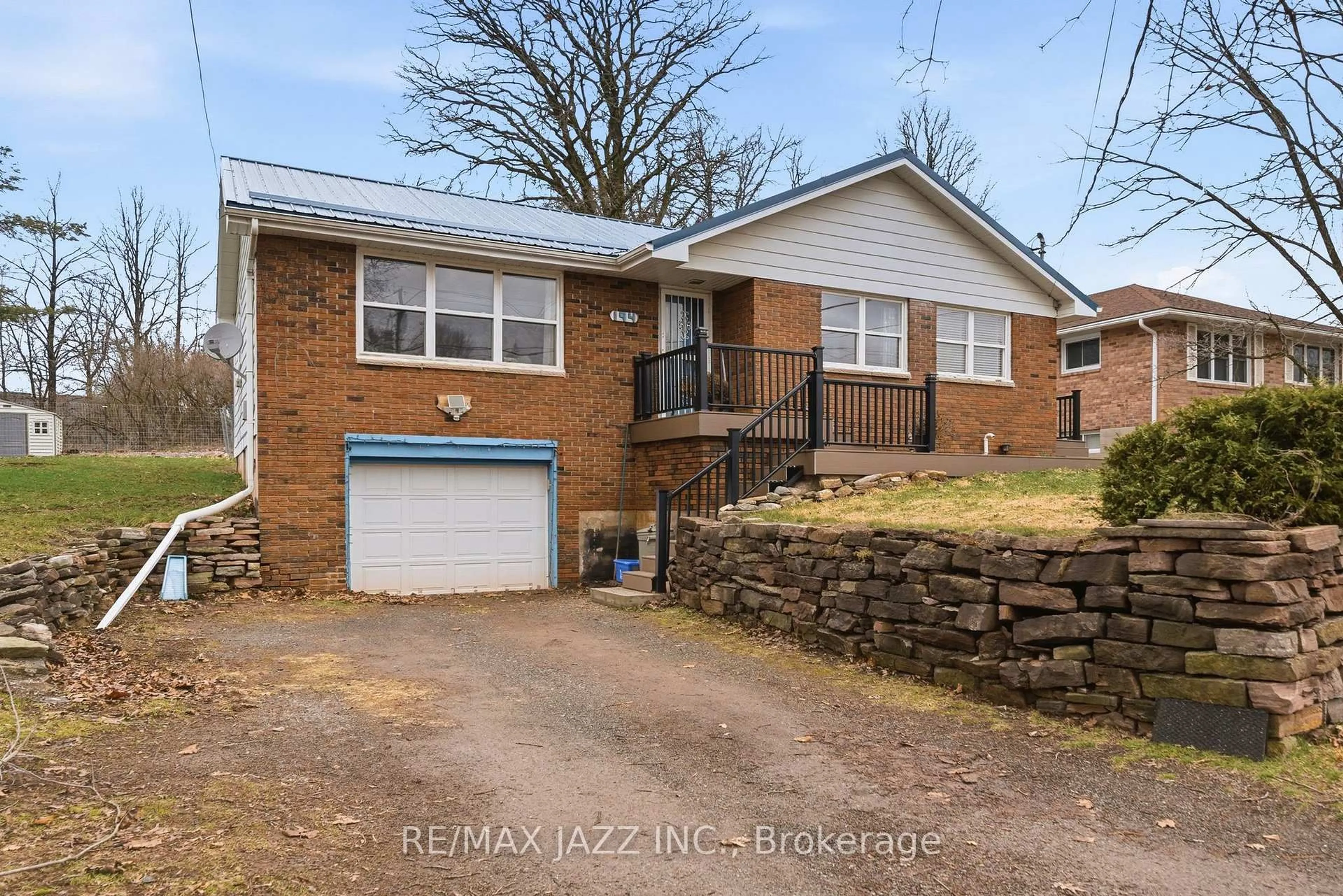 A pic from outside/outdoor area/front of a property/back of a property/a pic from drone, street for 194 St Lawrence St, Madoc Ontario K0K 2K0