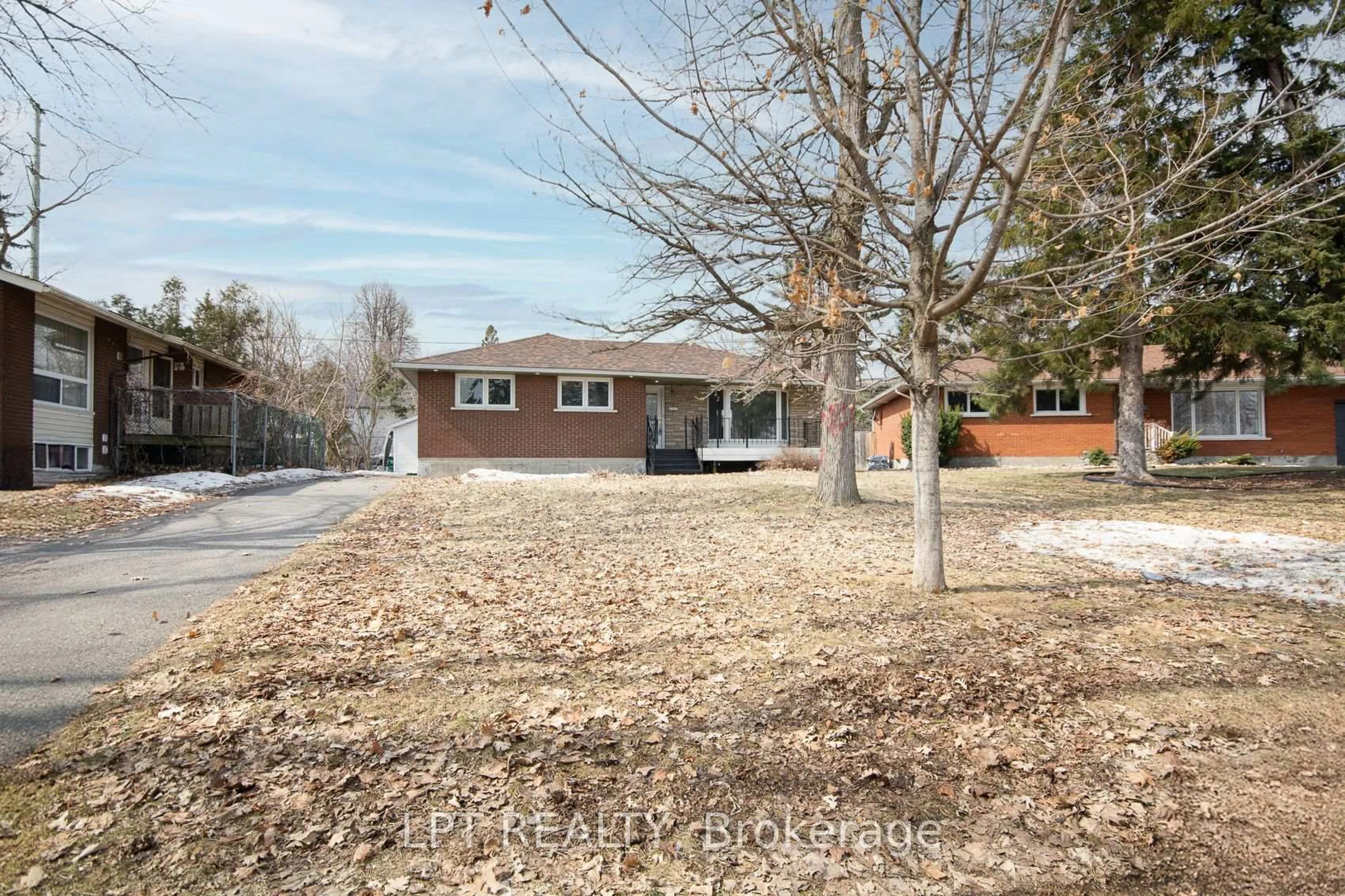 Home with brick exterior material, street for 2317 Elmira Dr, Ottawa Ontario K2C 1H3