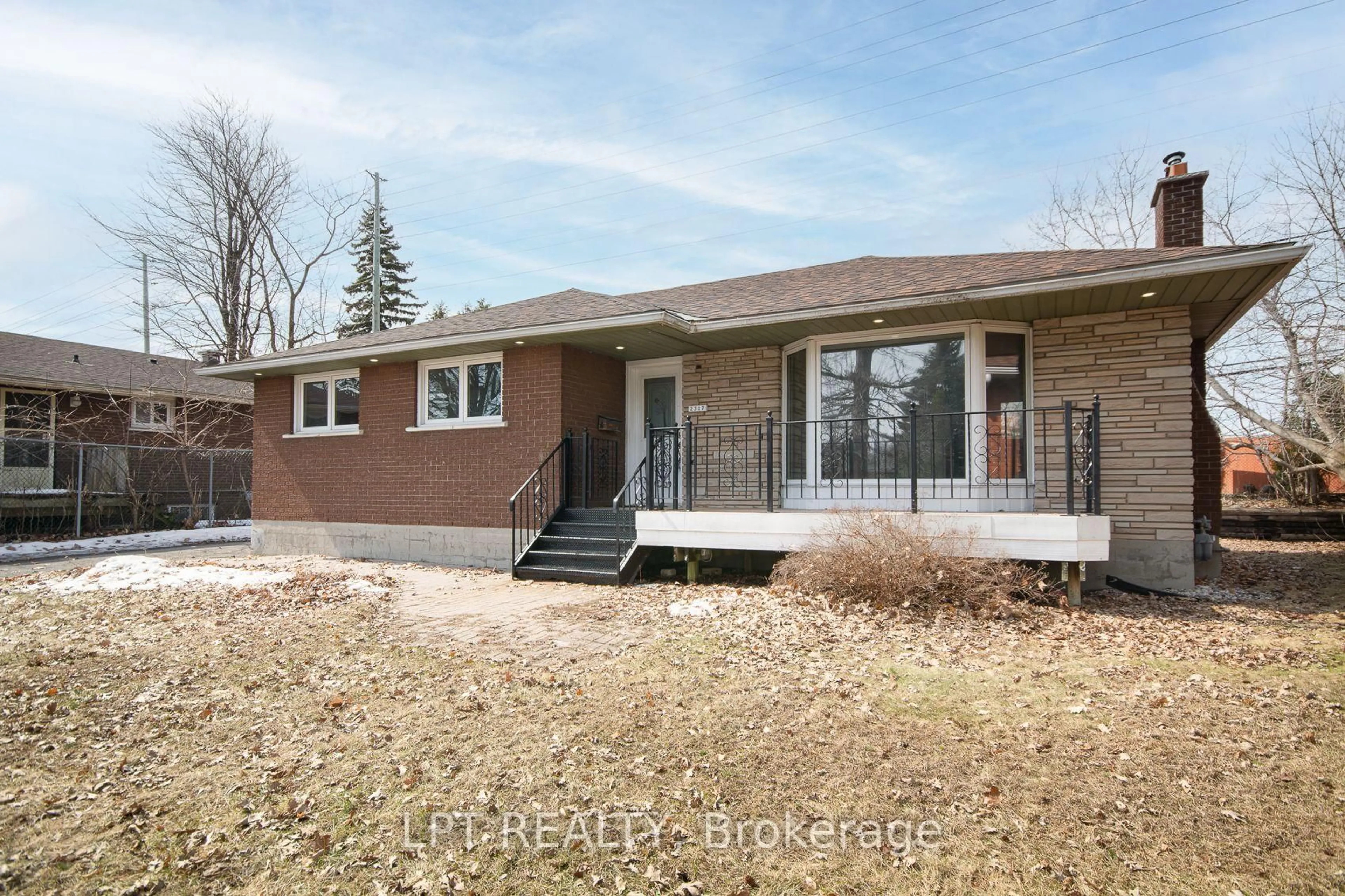 Home with brick exterior material, street for 2317 Elmira Dr, Ottawa Ontario K2C 1H3