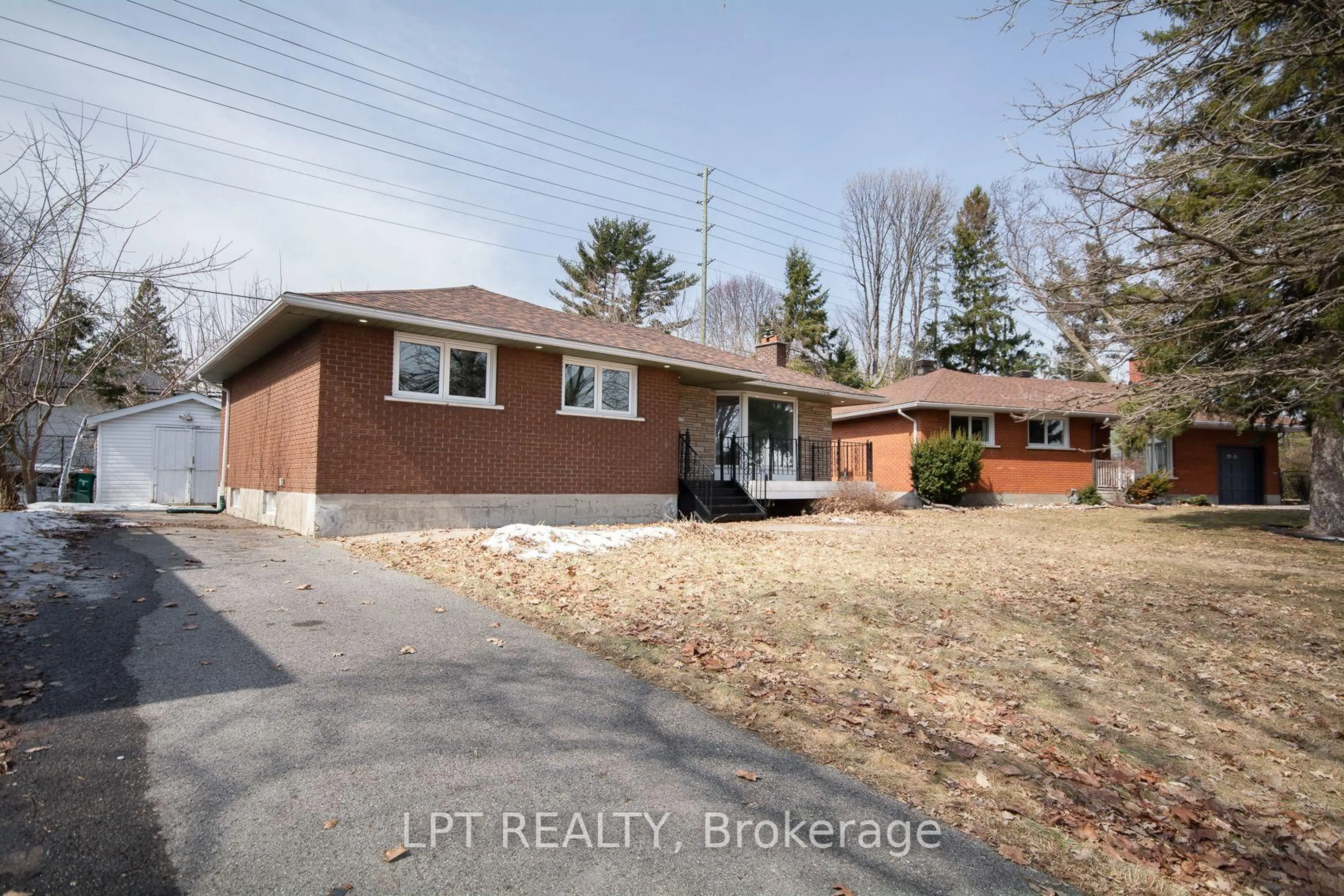 Home with brick exterior material, street for 2317 Elmira Dr, Ottawa Ontario K2C 1H3