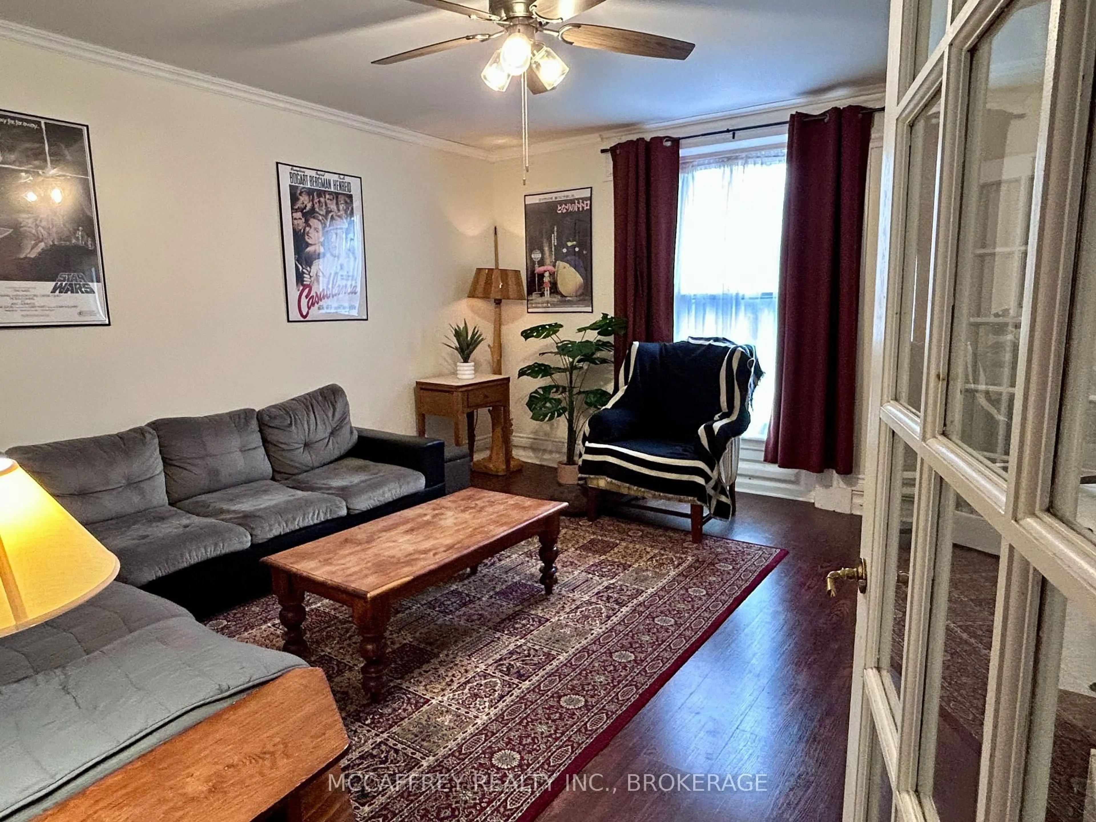 Living room with furniture, wood/laminate floor for 11 WATER St, Newburgh Ontario K0K 2S0