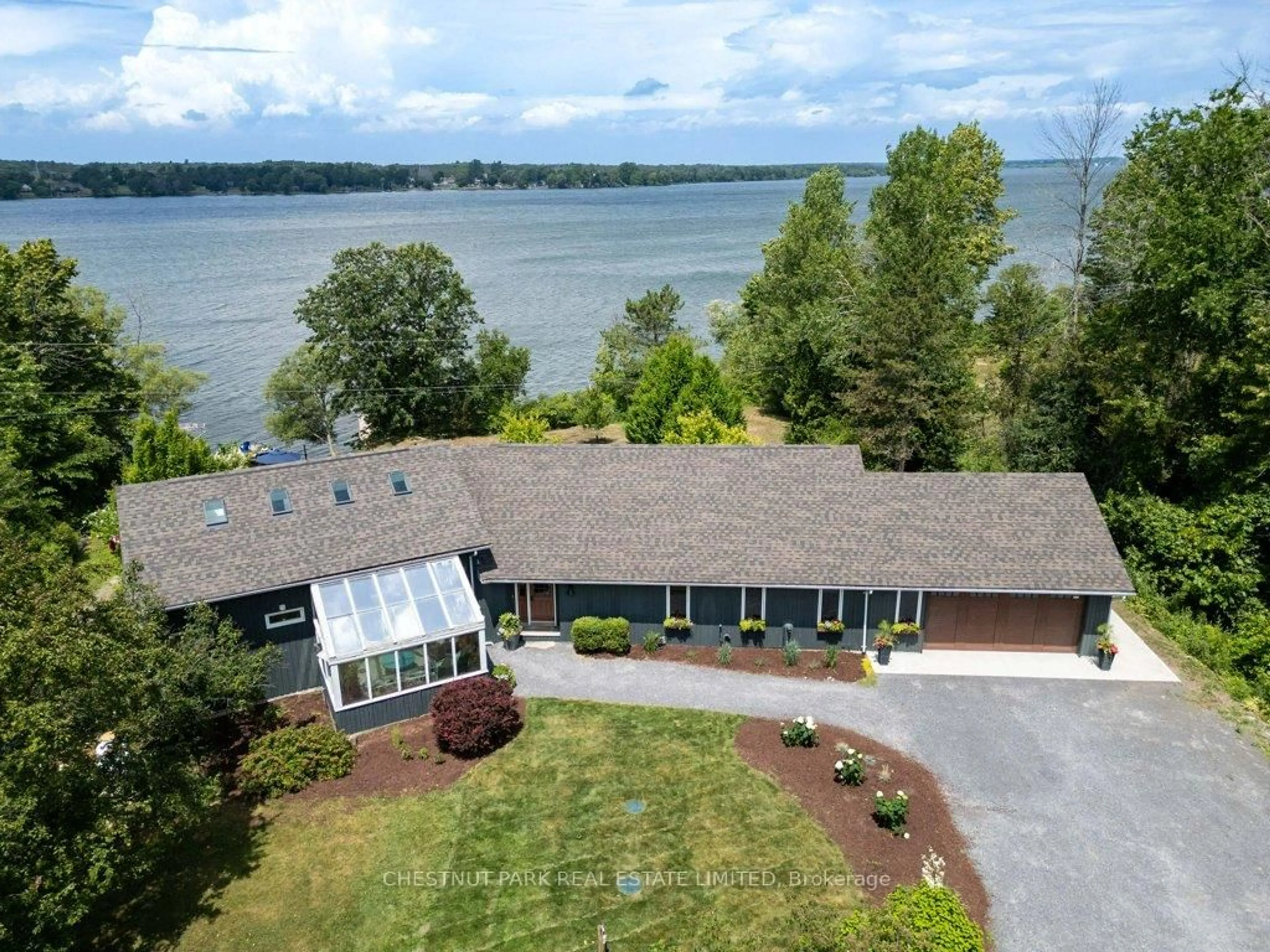 A pic from outside/outdoor area/front of a property/back of a property/a pic from drone, water/lake/river/ocean view for 3265 County Road 9, Napanee Ontario K7R 3K8