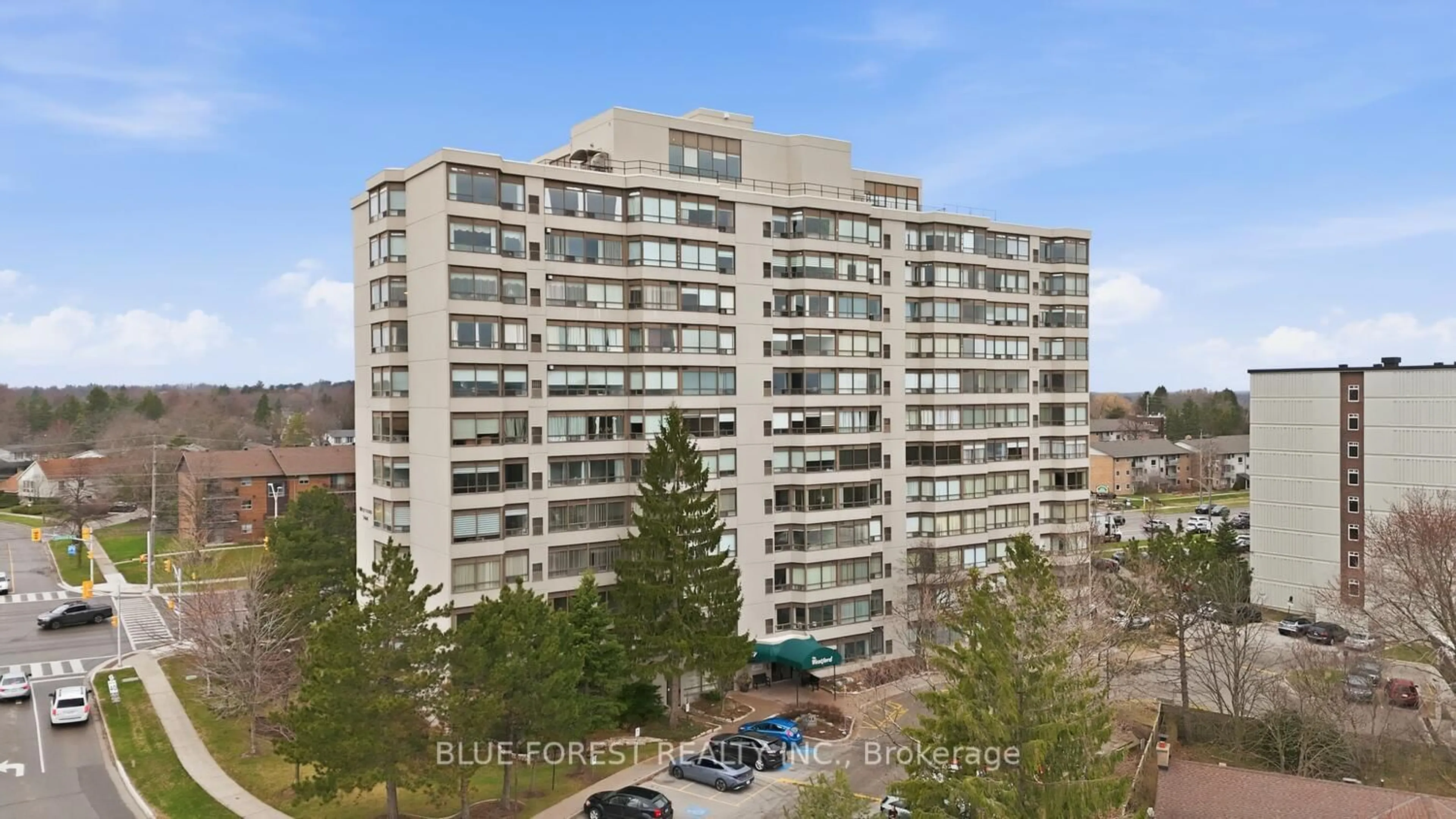 A pic from outside/outdoor area/front of a property/back of a property/a pic from drone, city buildings view from balcony for 744 Wonderland Rd #203, London South Ontario N6K 4K3