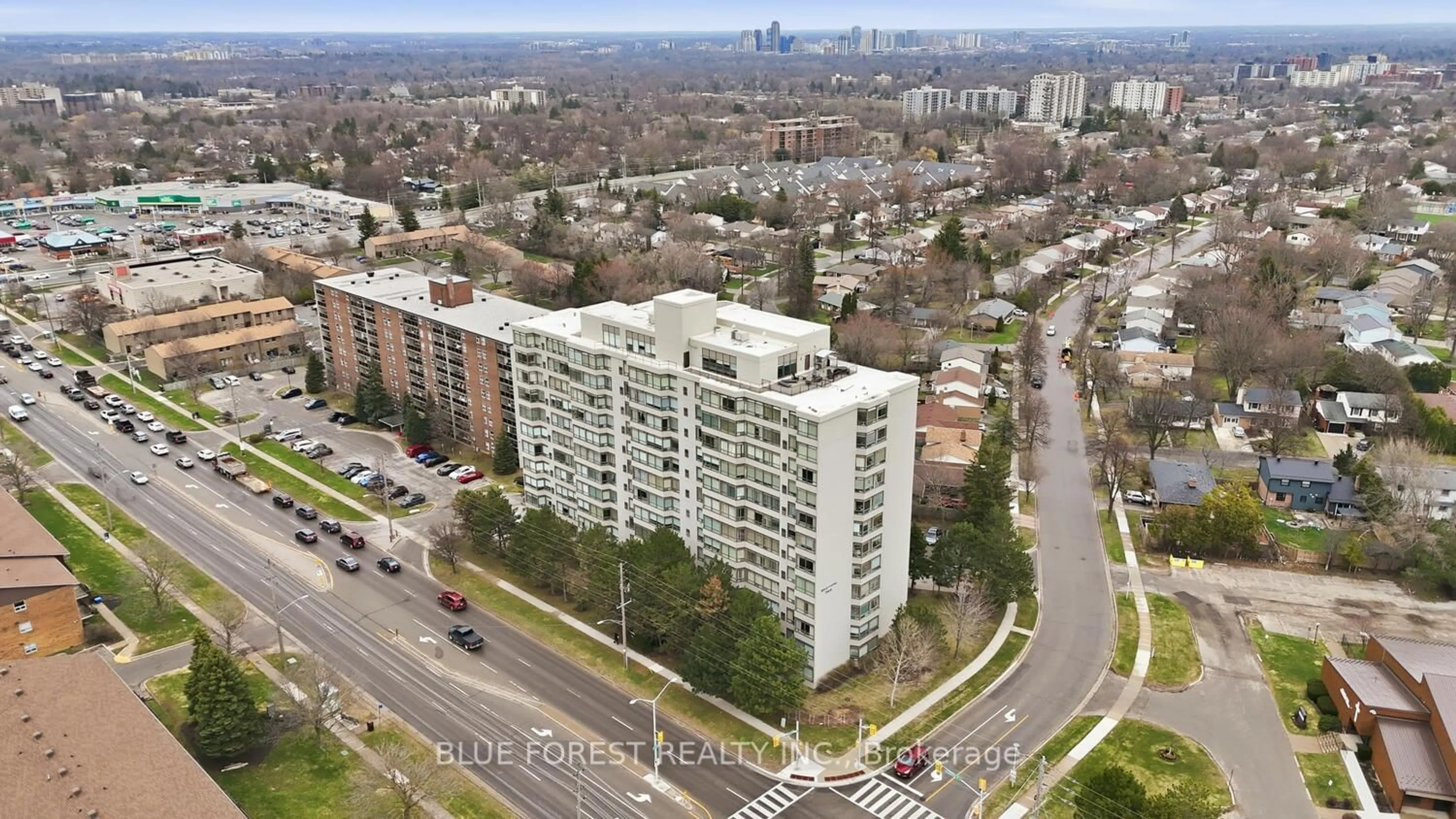 A pic from outside/outdoor area/front of a property/back of a property/a pic from drone, city buildings view from balcony for 744 Wonderland Rd #203, London South Ontario N6K 4K3