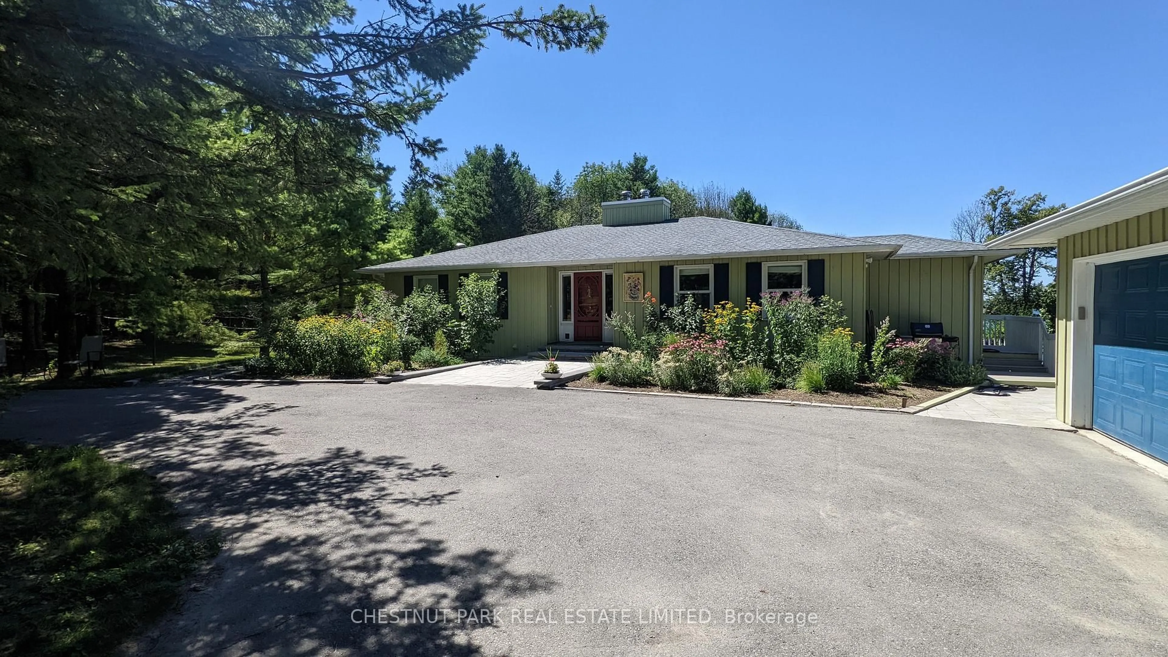 A pic from outside/outdoor area/front of a property/back of a property/a pic from drone, street for 3587 County Rd 7, Prince Edward County Ontario K0K 2T0