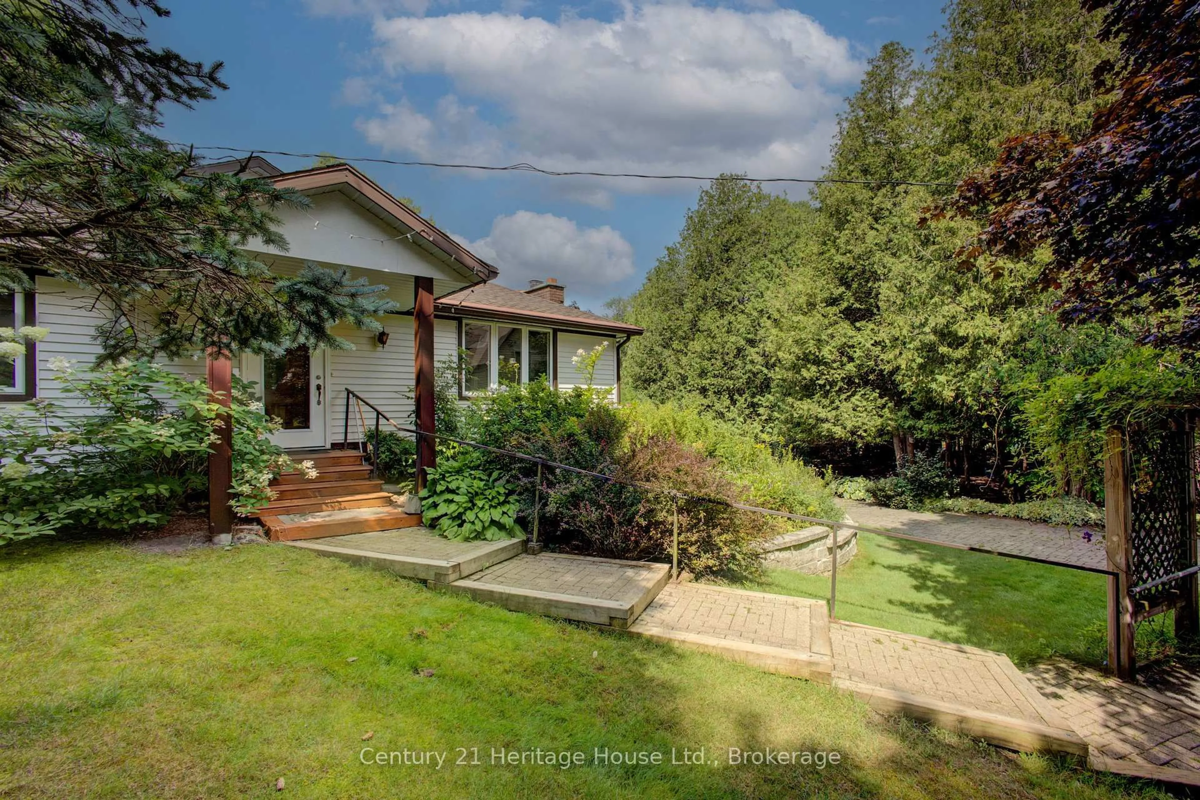 A pic from outside/outdoor area/front of a property/back of a property/a pic from drone, street for 473514 Camp Oliver Rd, West Grey Ontario N0C 1K0