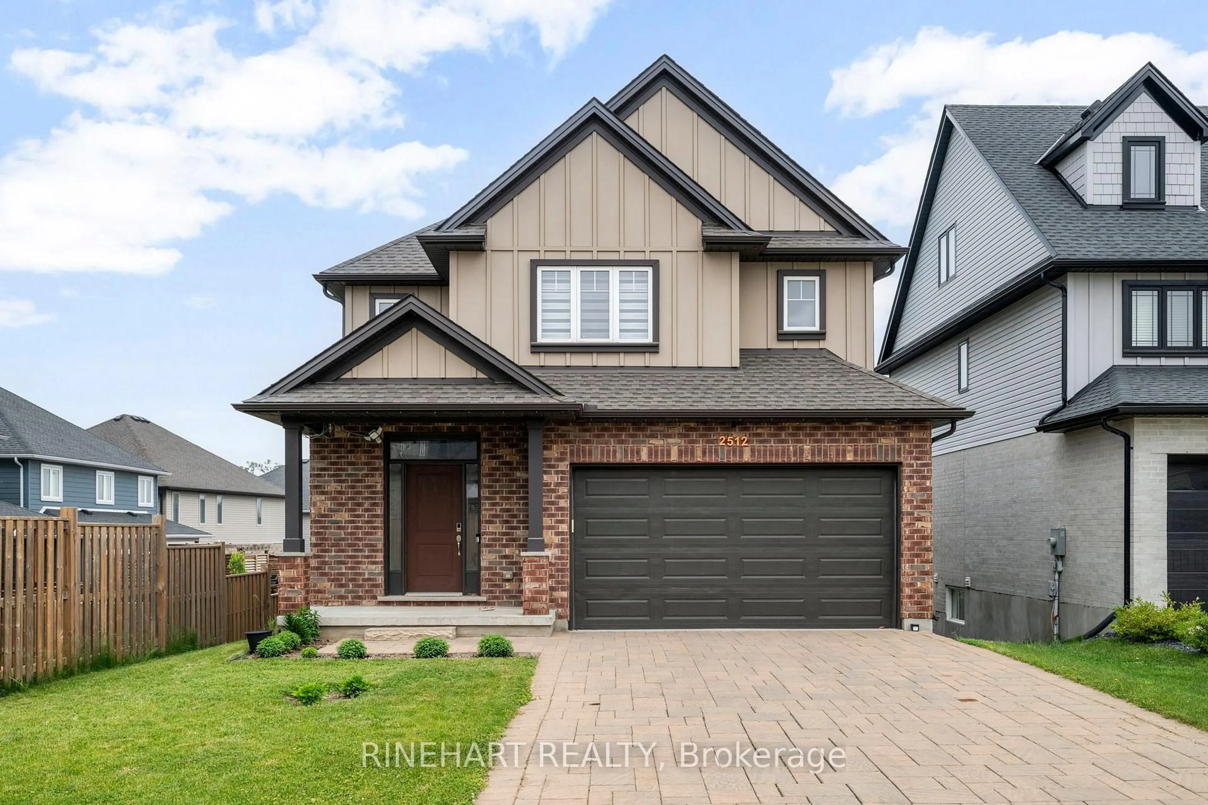 Home with brick exterior material, street for 2512 Holbrook Dr, London South Ontario N6M 0E6