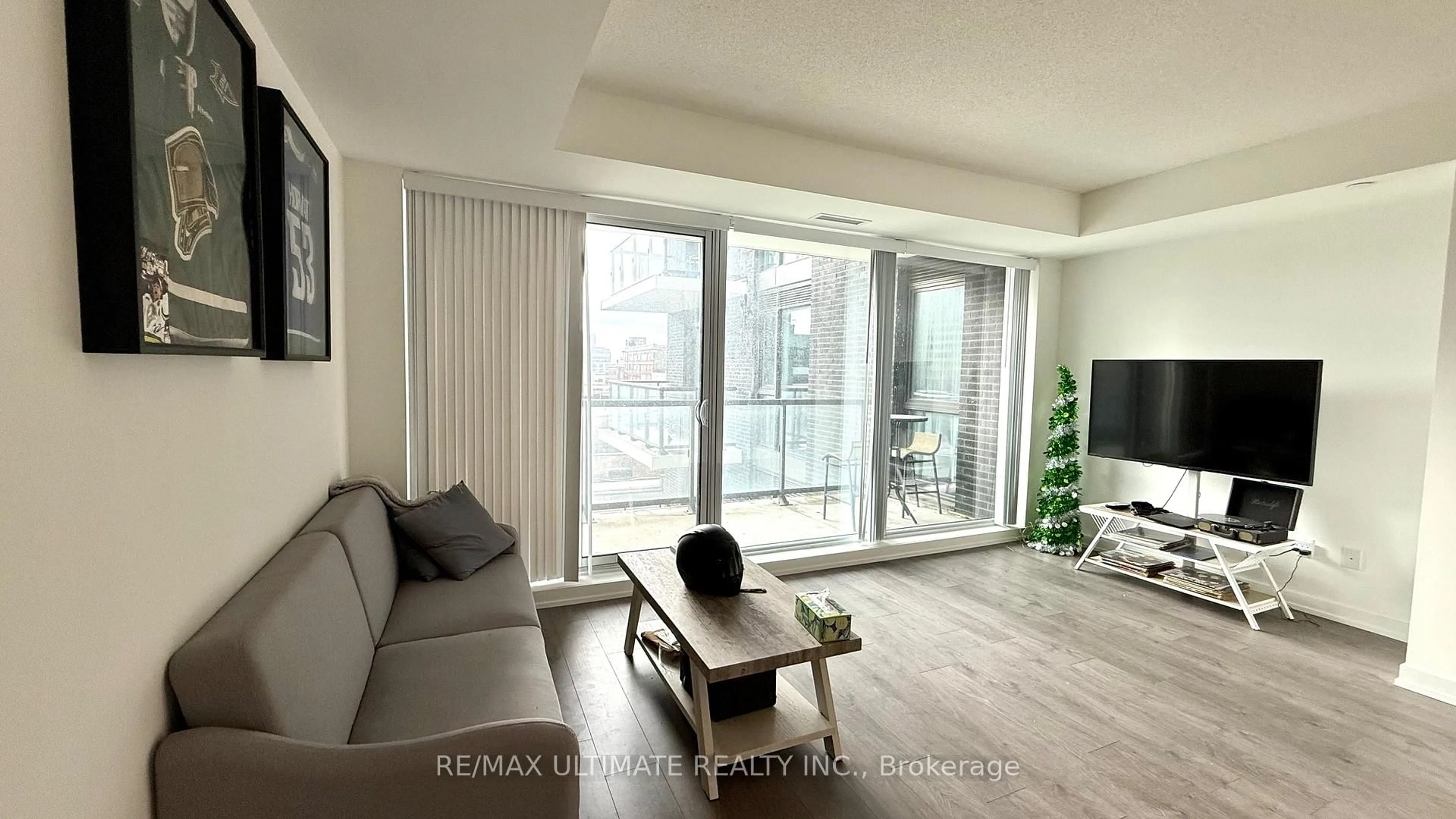 Living room with furniture, unknown for 55 Duke St #318, Kitchener Ontario N2H 0C9