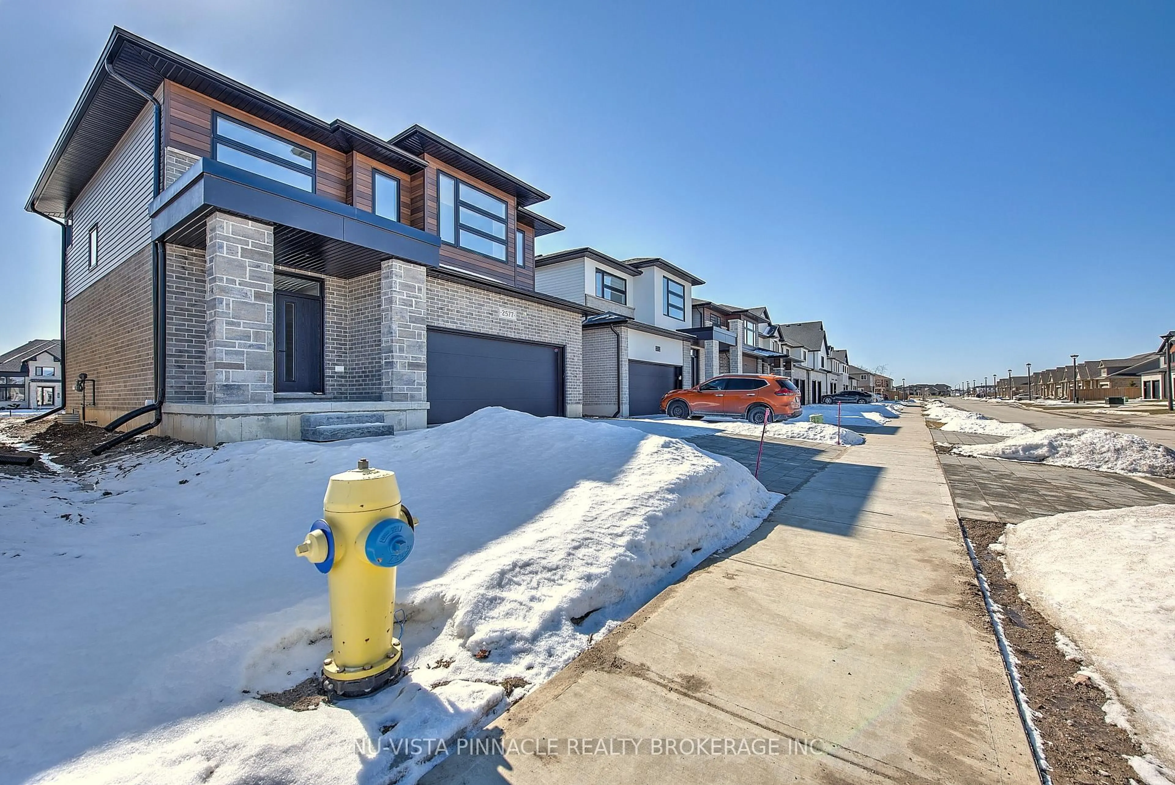 A pic from outside/outdoor area/front of a property/back of a property/a pic from drone, street for 2577 Buroak Dr, London North Ontario N6G 3W1