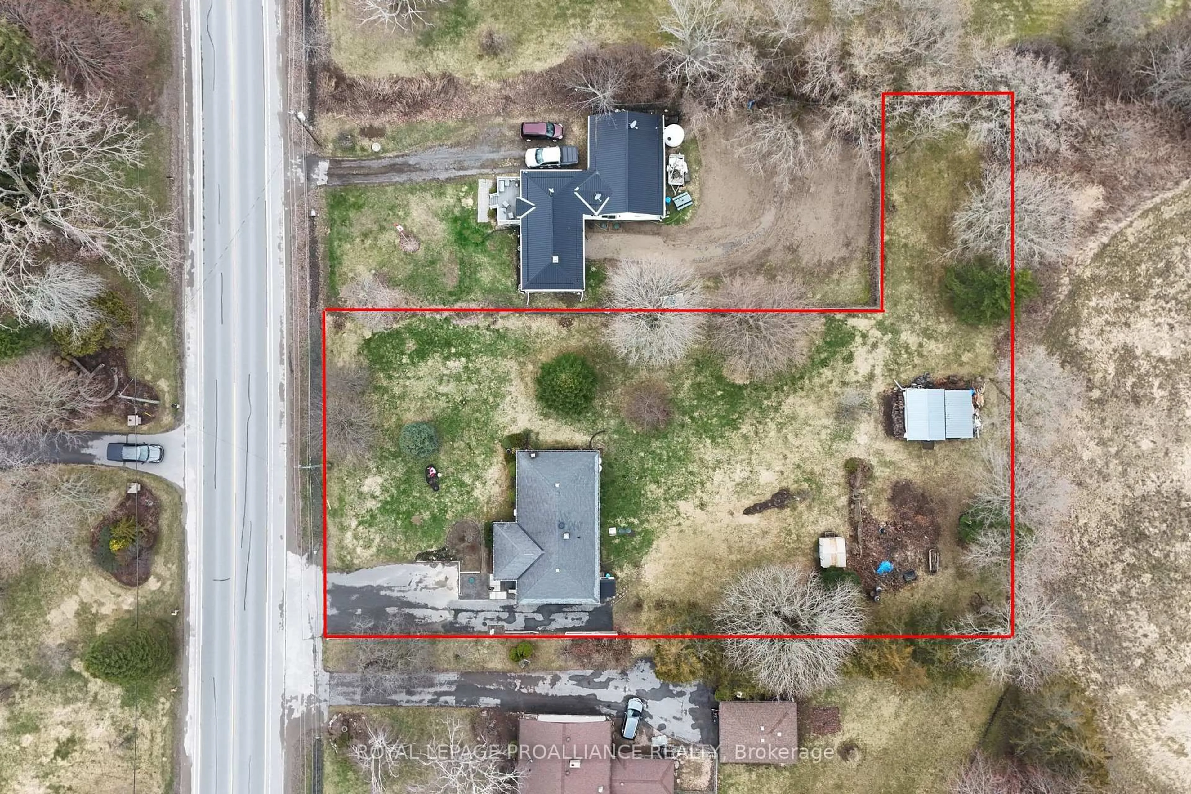 A pic from outside/outdoor area/front of a property/back of a property/a pic from drone, street for 471 County Road 3, Prince Edward County Ontario K8N 4Z1