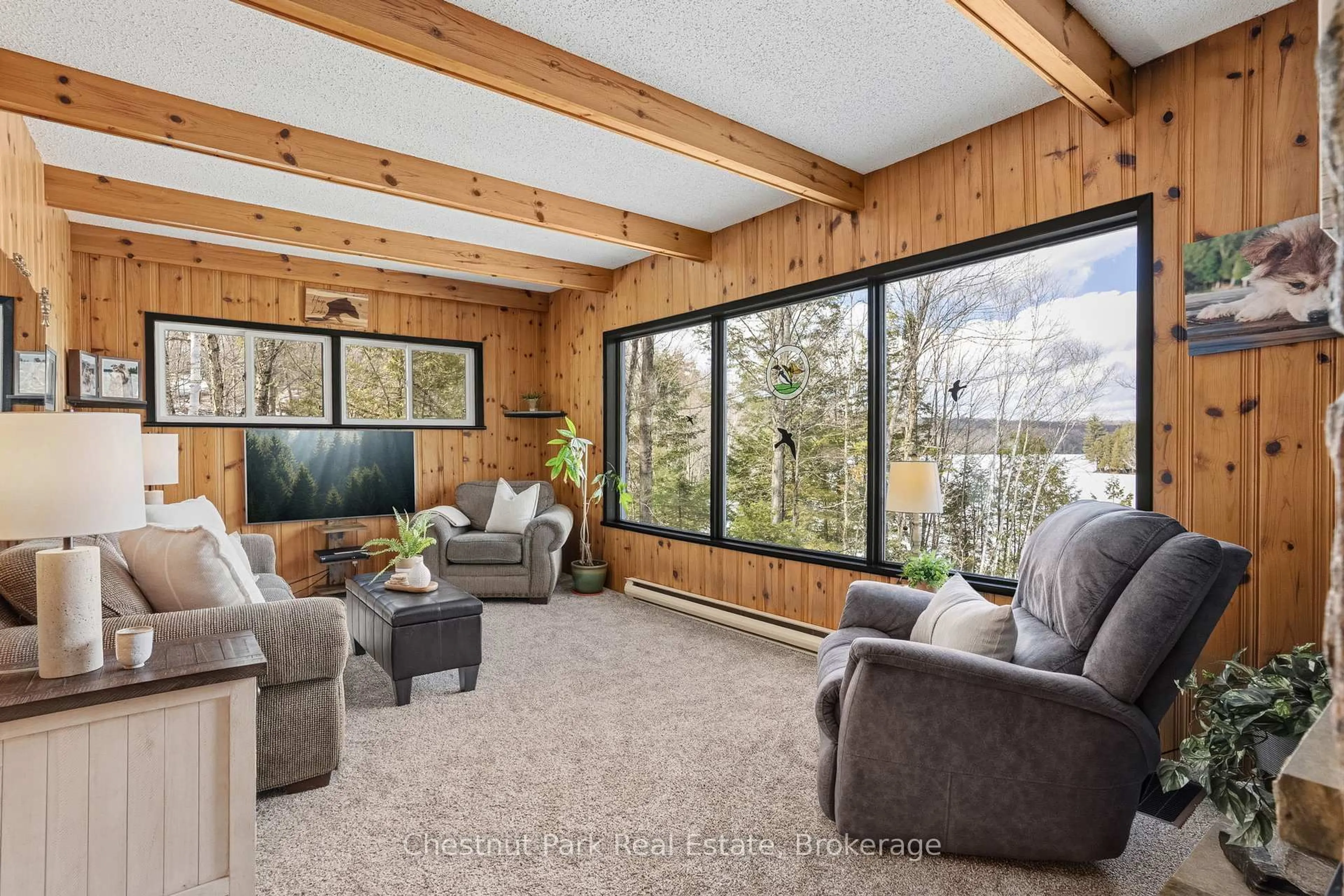 Living room with furniture, unknown for 527 Harp Lake Rd, Huntsville Ontario P1H 2J6