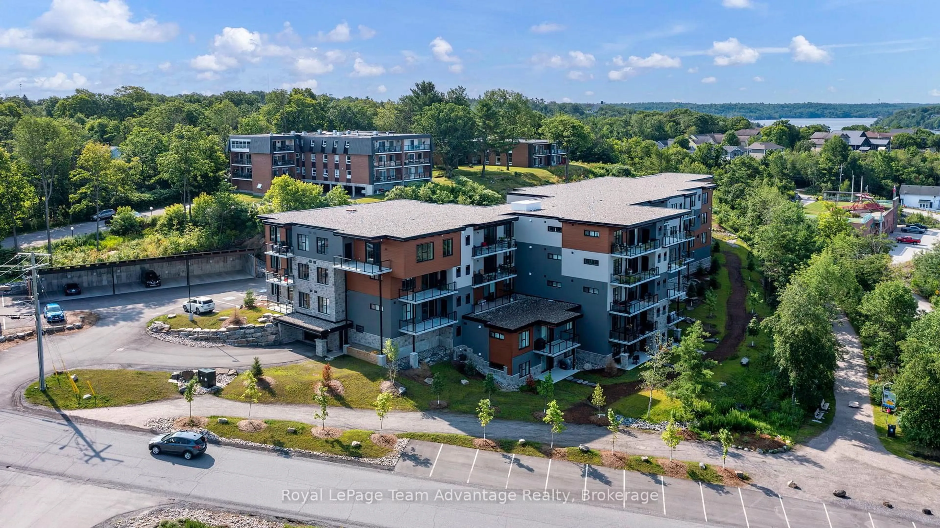 A pic from outside/outdoor area/front of a property/back of a property/a pic from drone, unknown for 20 Salt Dock Rd #305, Parry Sound Ontario P2A 0E7