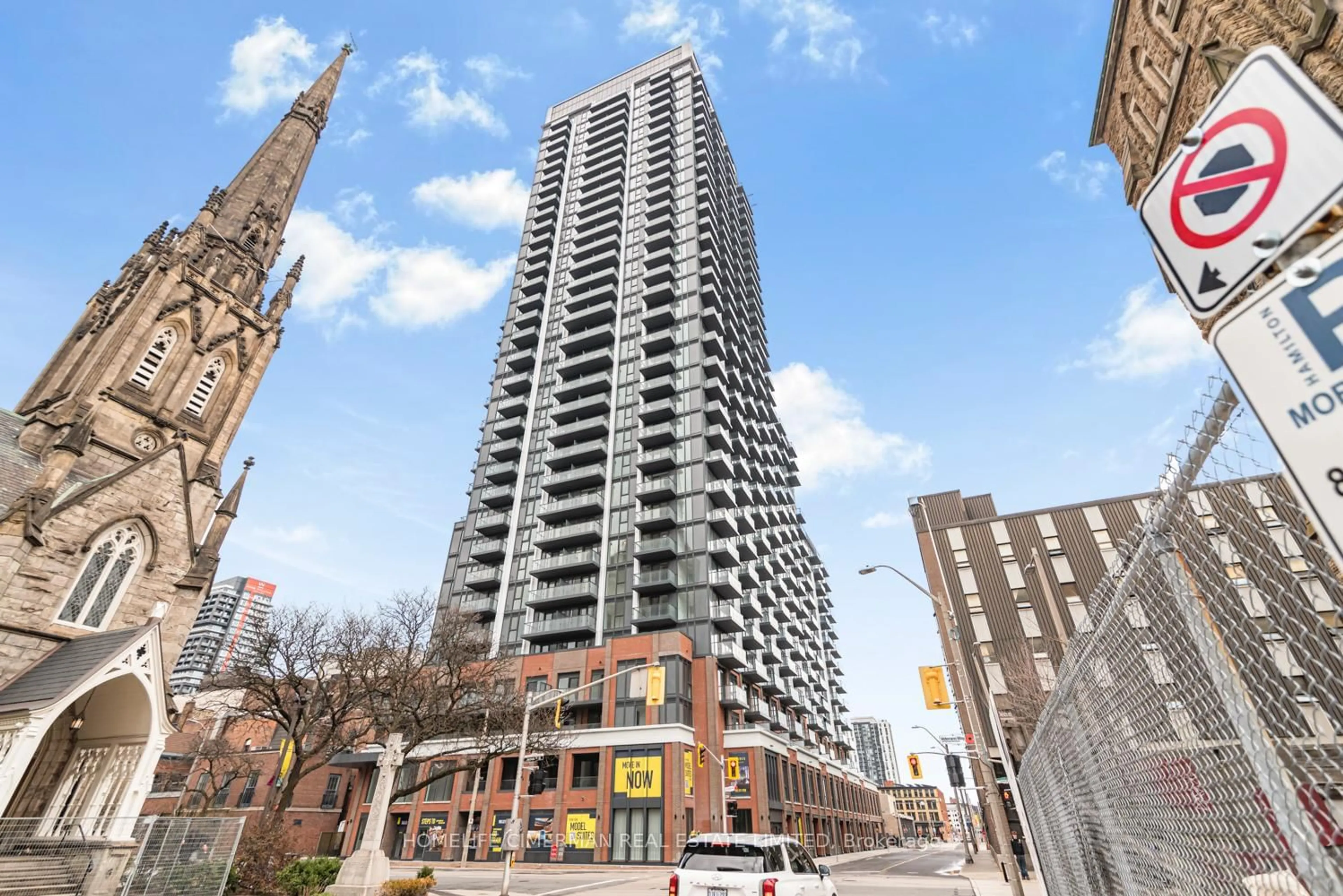 Patio, city buildings view from balcony for 75 James St #2016, Hamilton Ontario L8P 2Y9