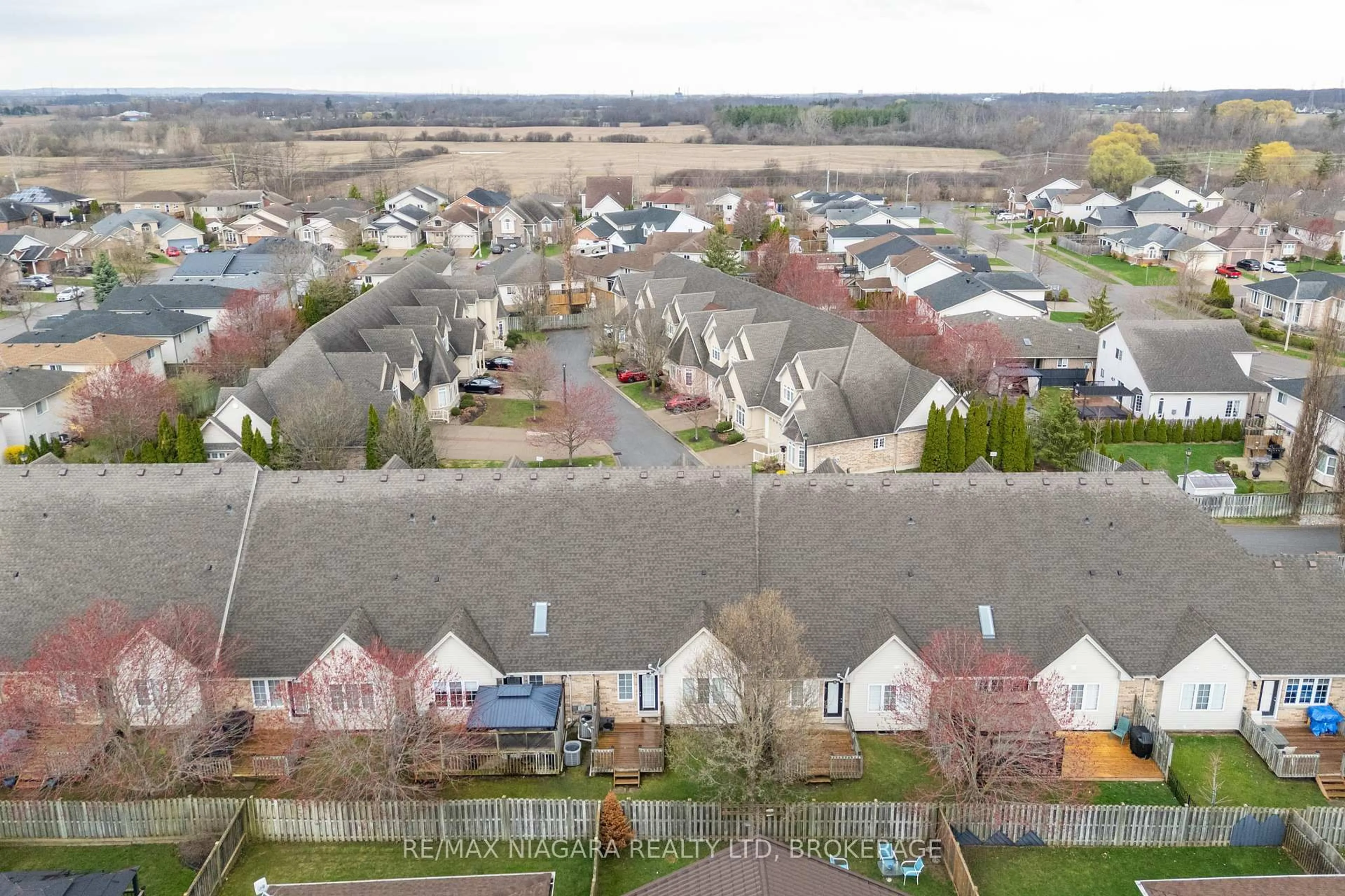 A pic from outside/outdoor area/front of a property/back of a property/a pic from drone, street for 8142 Costabile Dr #16, Niagara Falls Ontario L2H 3M3