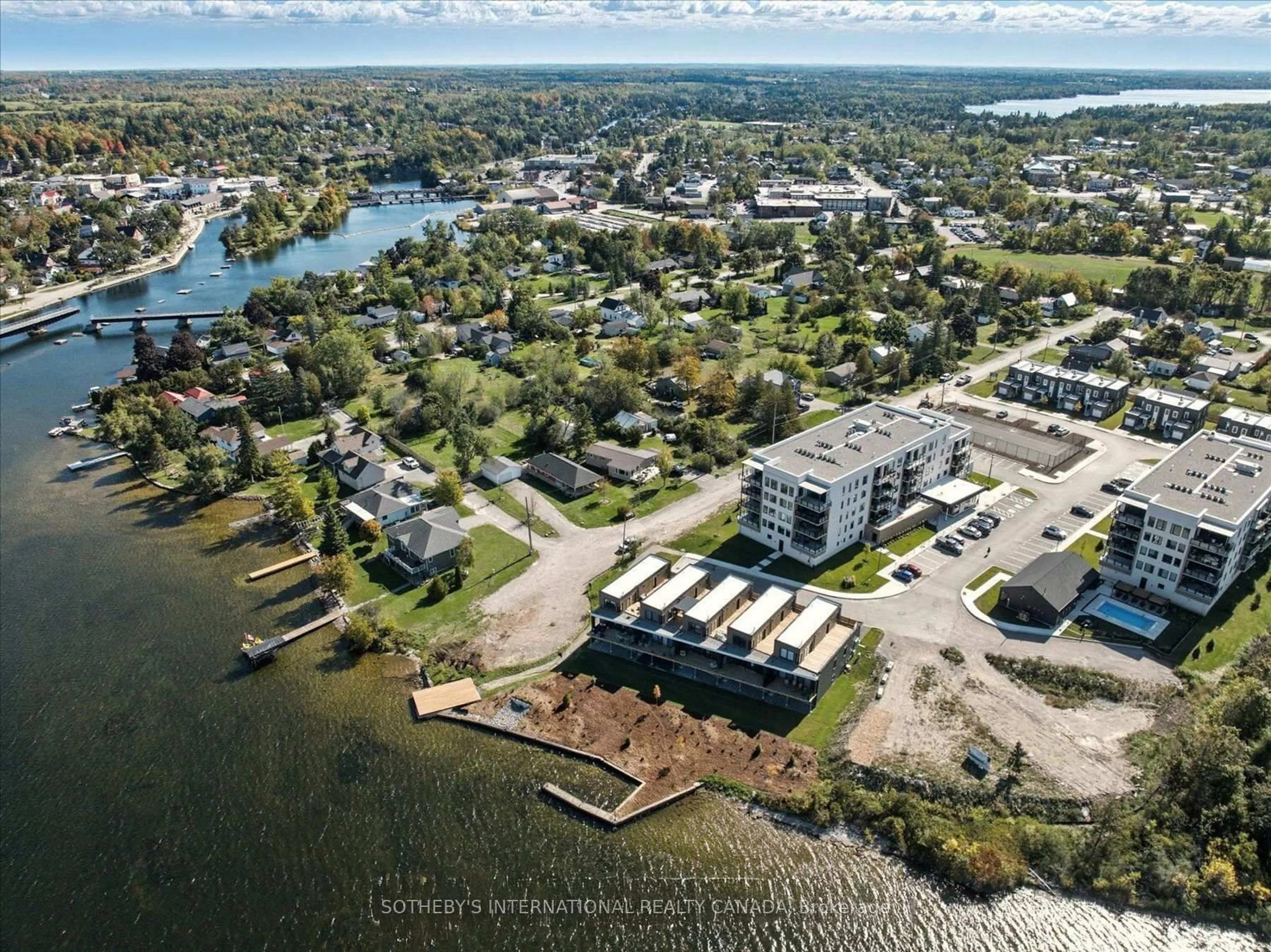 A pic from outside/outdoor area/front of a property/back of a property/a pic from drone, water/lake/river/ocean view for 19B West St #306, Kawartha Lakes Ontario K0M 1N0
