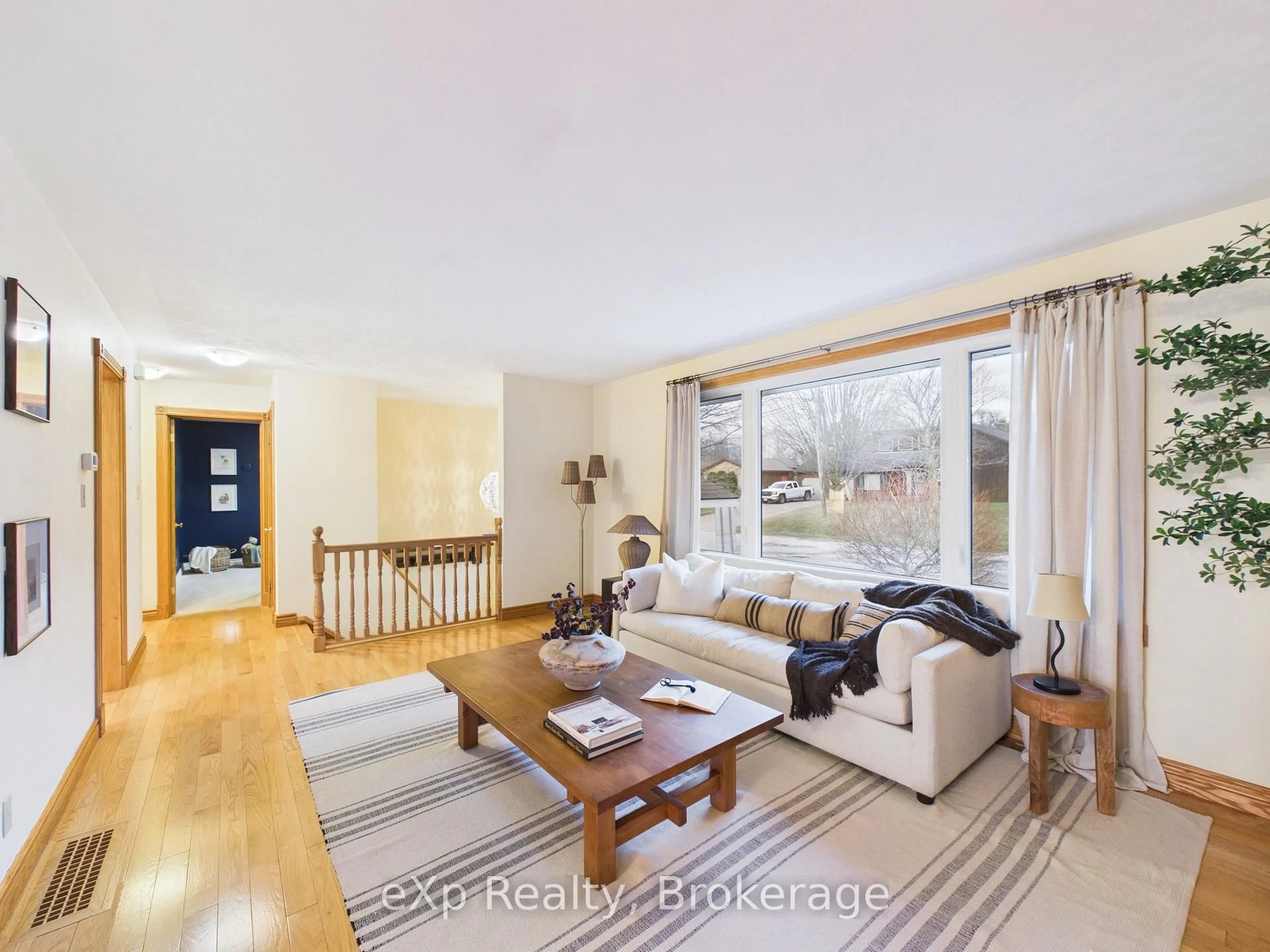 Living room with furniture, wood/laminate floor for 422 Wellington St, Saugeen Shores Ontario N0H 2C4