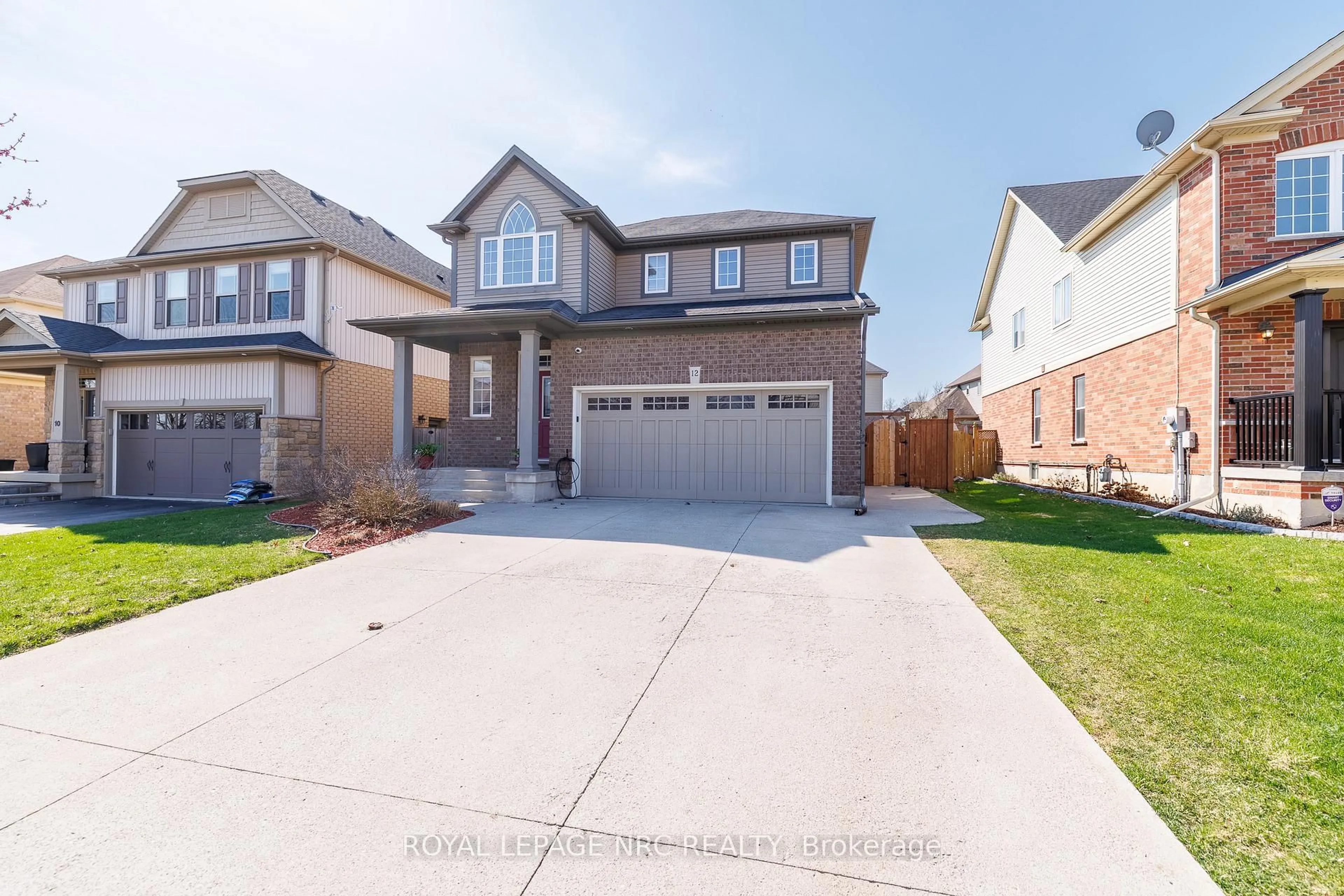 Home with brick exterior material, street for 12 Wilfrid Laurier Cres, St. Catharines Ontario L2P 0A4
