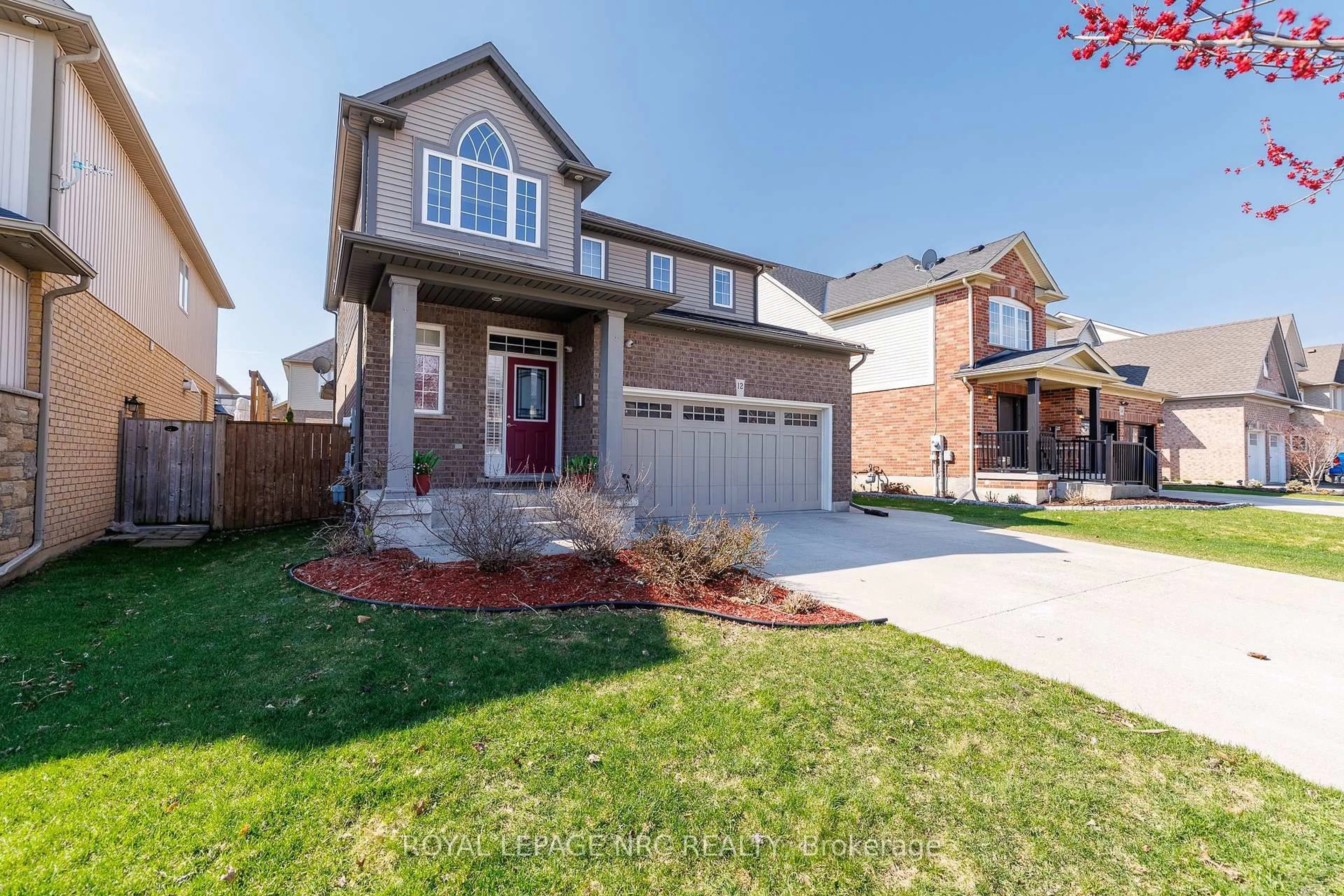 Home with brick exterior material, street for 12 Wilfrid Laurier Cres, St. Catharines Ontario L2P 0A4