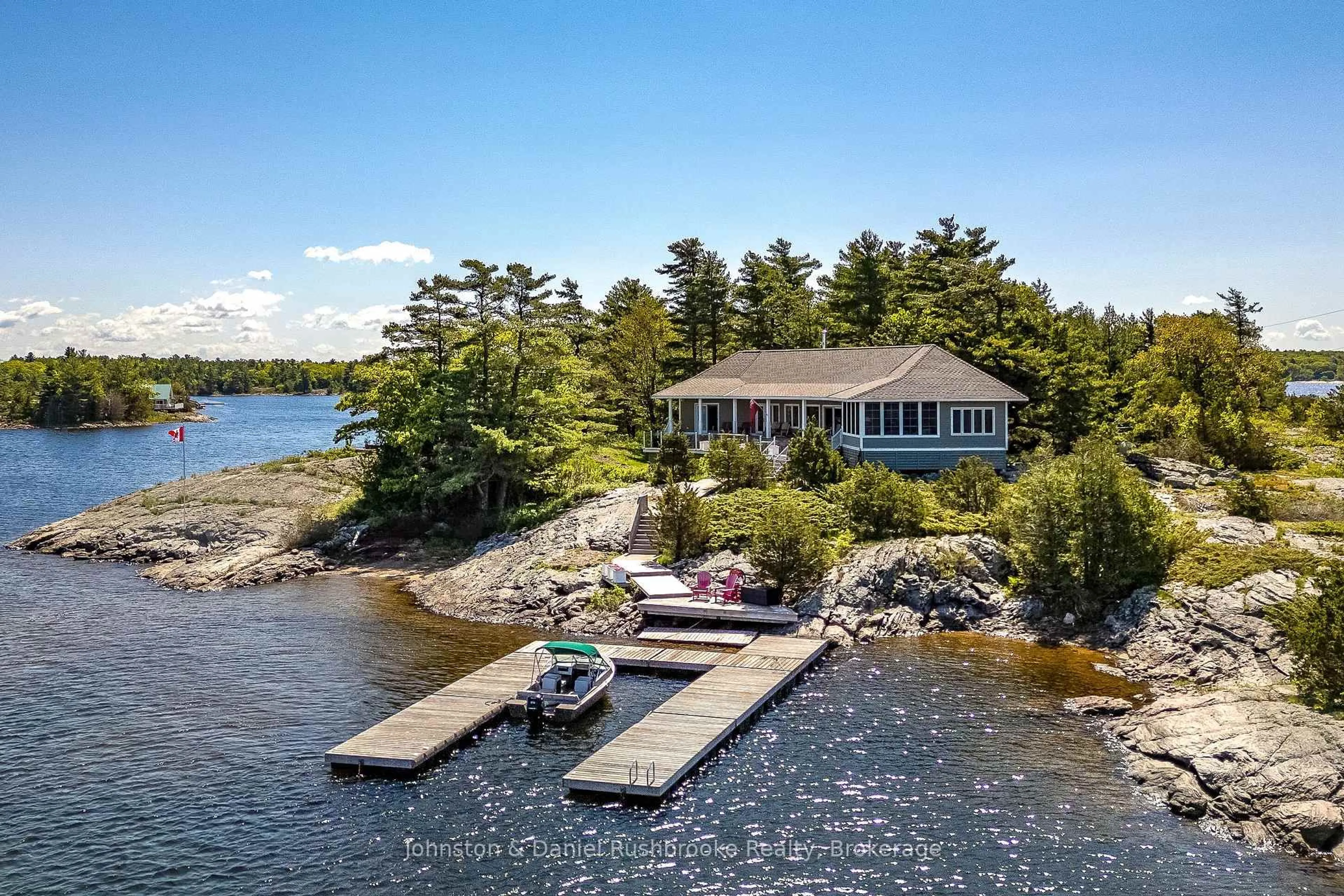 A pic from outside/outdoor area/front of a property/back of a property/a pic from drone, water/lake/river/ocean view for 2 Island 1210, Georgian Bay Ontario P0E 1E0