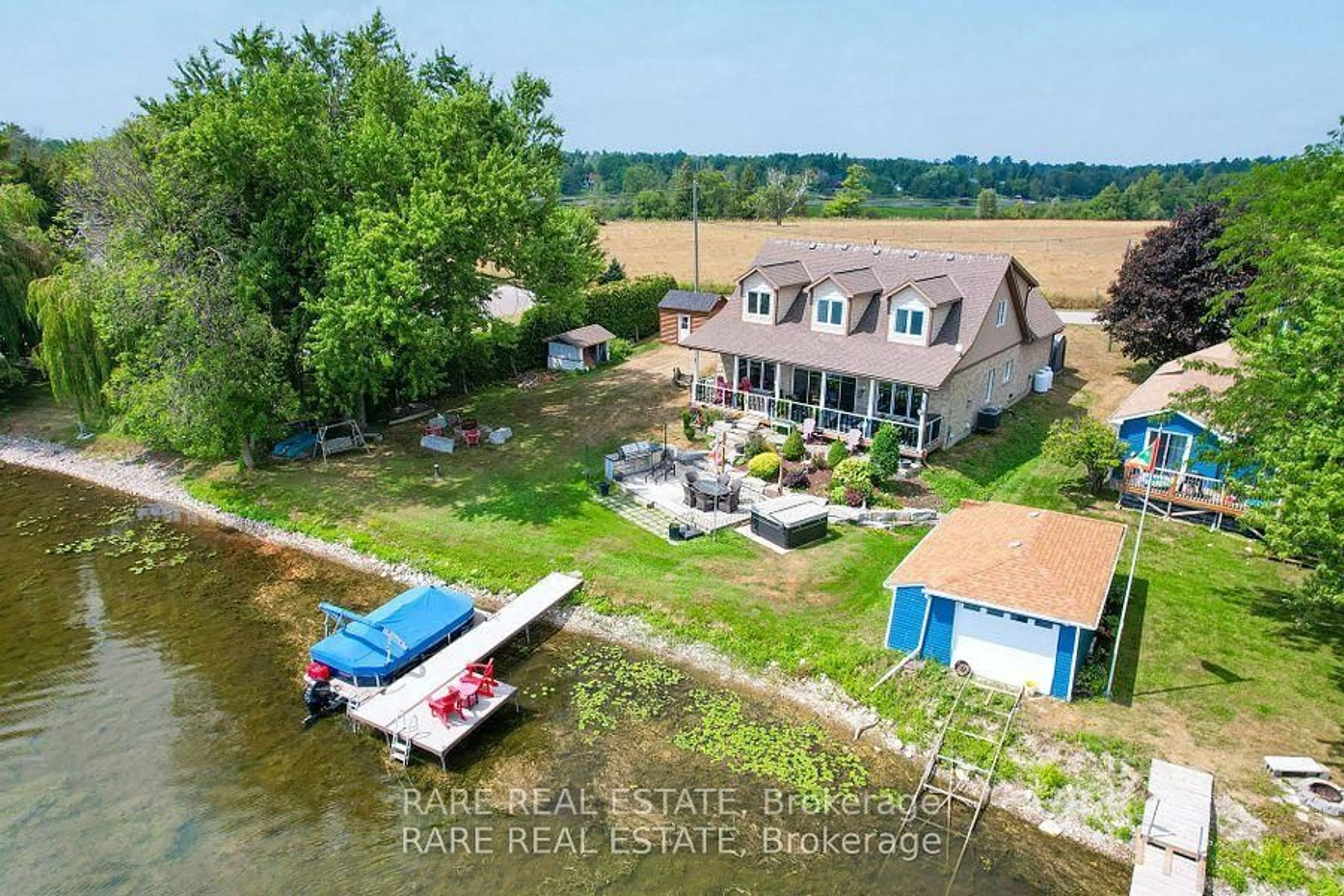 A pic from outside/outdoor area/front of a property/back of a property/a pic from drone, water/lake/river/ocean view for 69 Marsh Creek Rd, Kawartha Lakes Ontario K0M 2C0