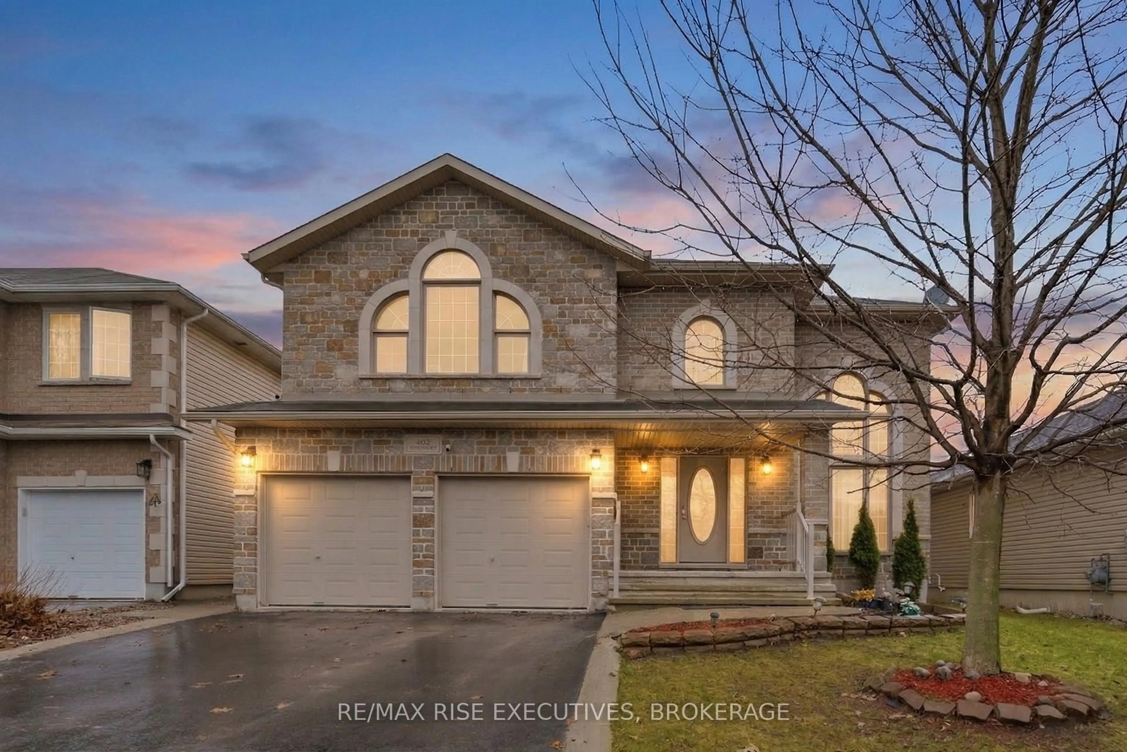 Home with brick exterior material, street for 402 Cavendish Cres, Kingston Ontario K7P 3E3