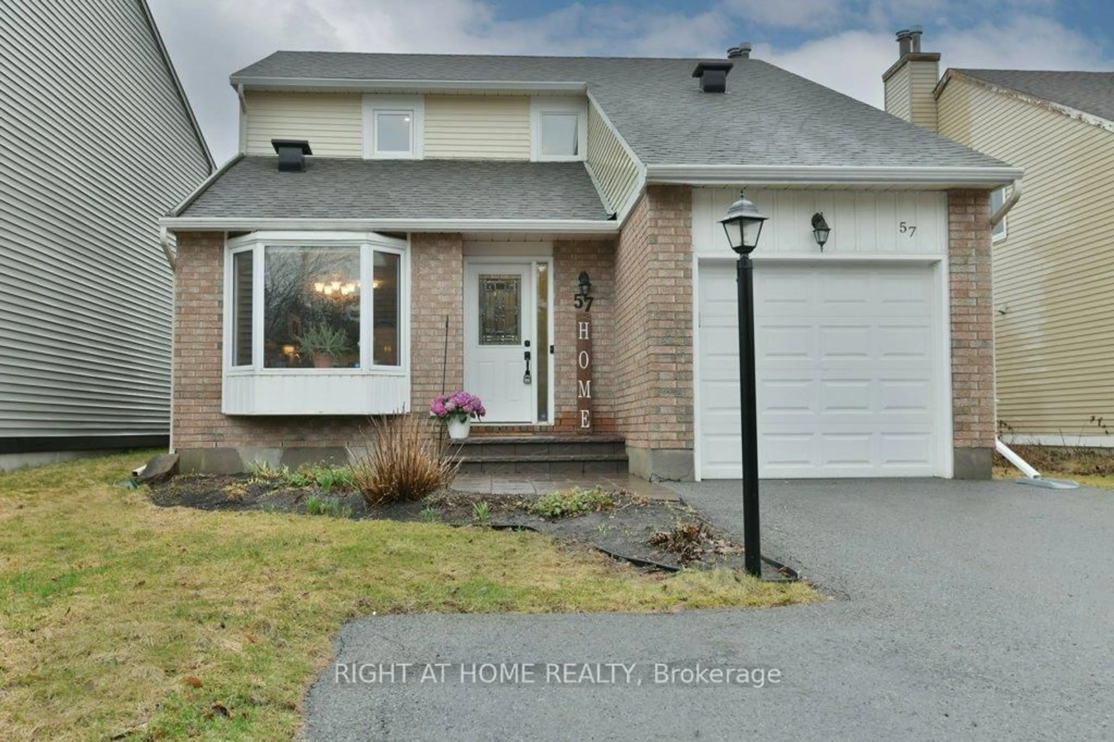 Home with brick exterior material, street for 57 Chester Cres, Ottawa Ontario K2J 2J6