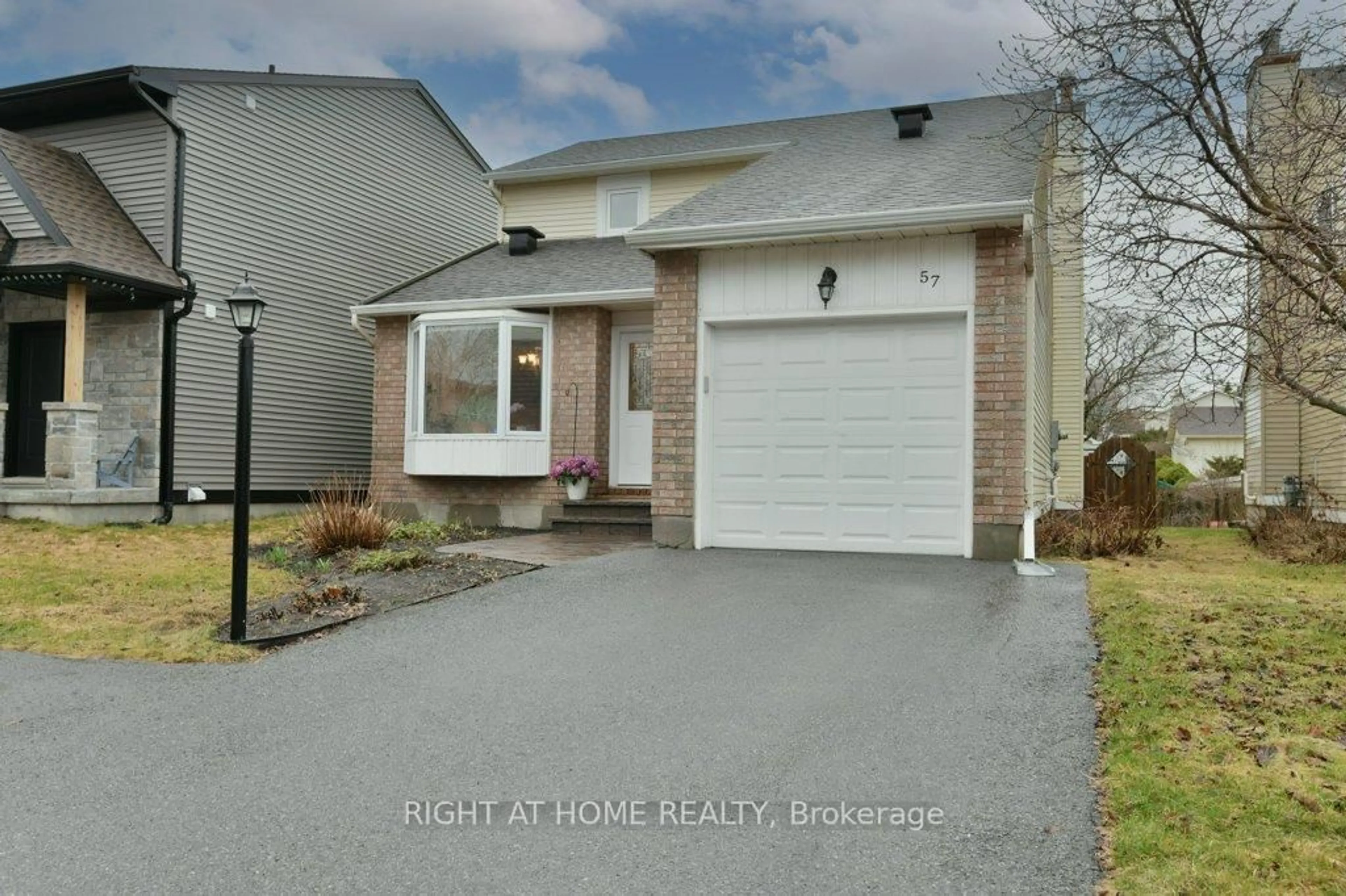 A pic from outside/outdoor area/front of a property/back of a property/a pic from drone, street for 57 Chester Cres, Ottawa Ontario K2J 2J6