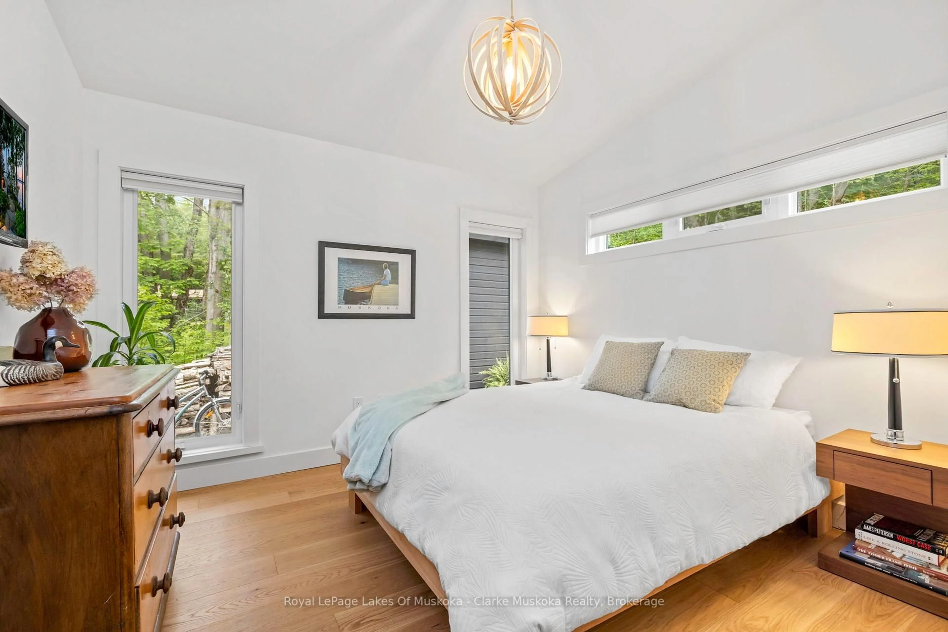 Bedroom with bed, wood/laminate floor for 56 Blair Point Rd, Seguin Ontario P0C 1J0