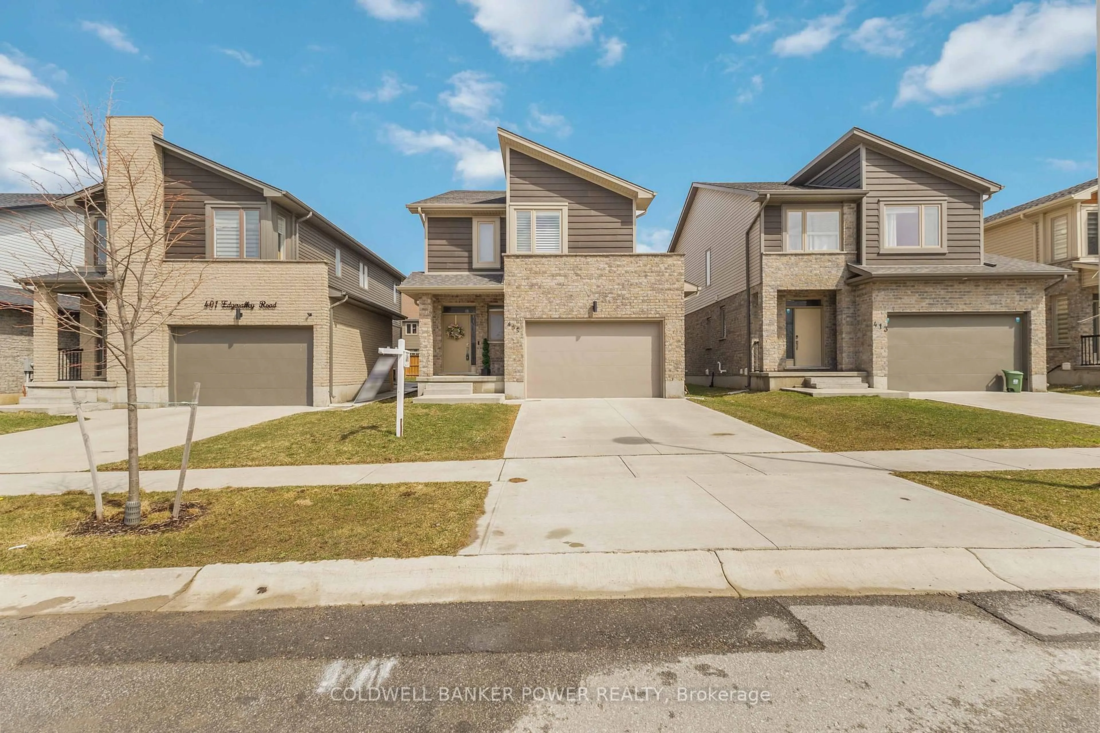 A pic from outside/outdoor area/front of a property/back of a property/a pic from drone, street for 405 Edgevalley Rd, London East Ontario N5V 0C2