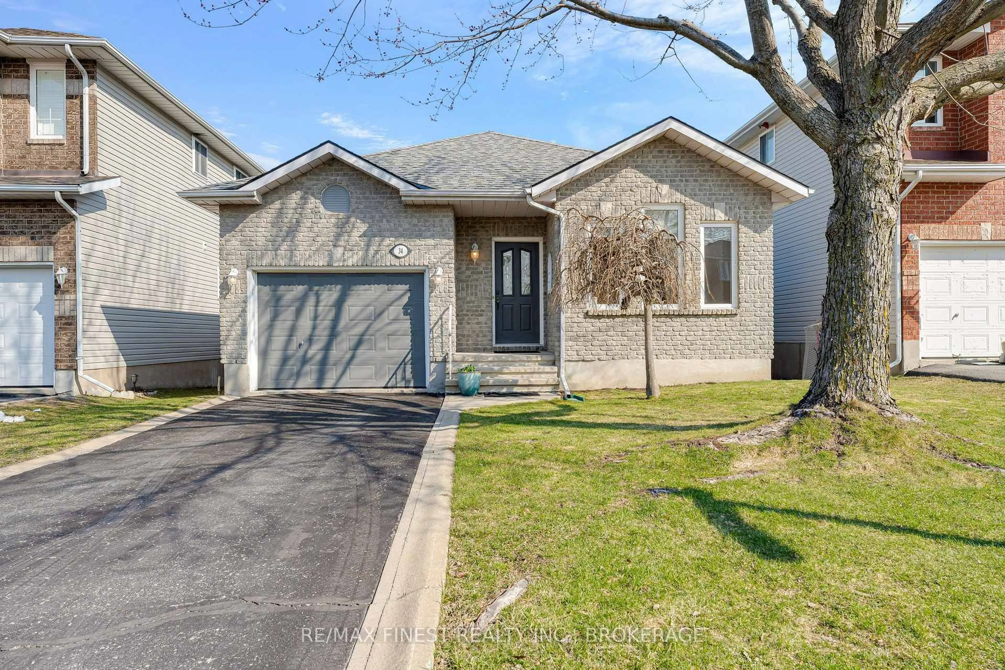 Home with brick exterior material, street for 34 Schooner Dr, Kingston Ontario K7K 7J8