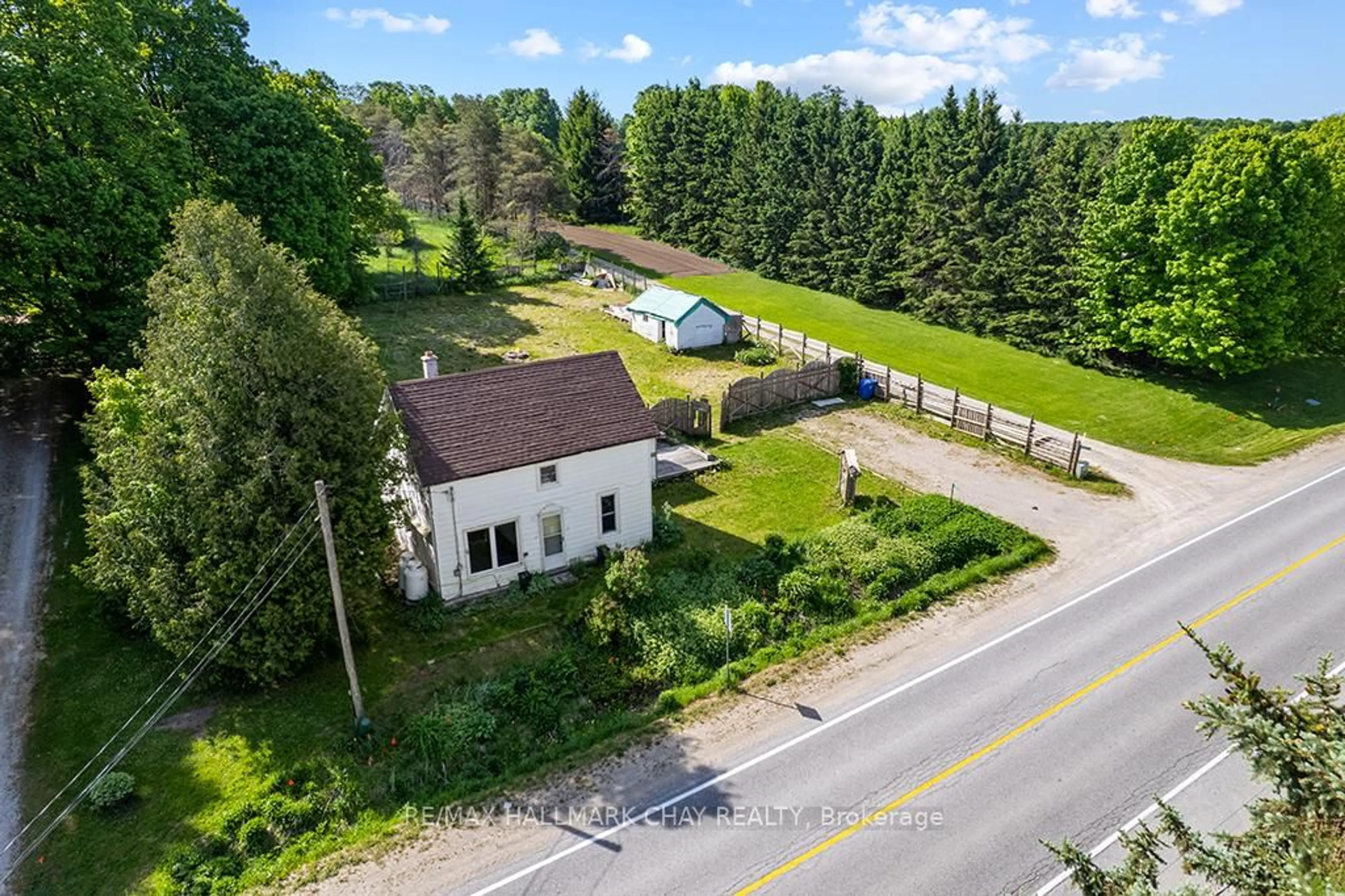 A pic from outside/outdoor area/front of a property/back of a property/a pic from drone, street for 500218 Grey Road 12 Rd, West Grey Ontario N0C 1H0