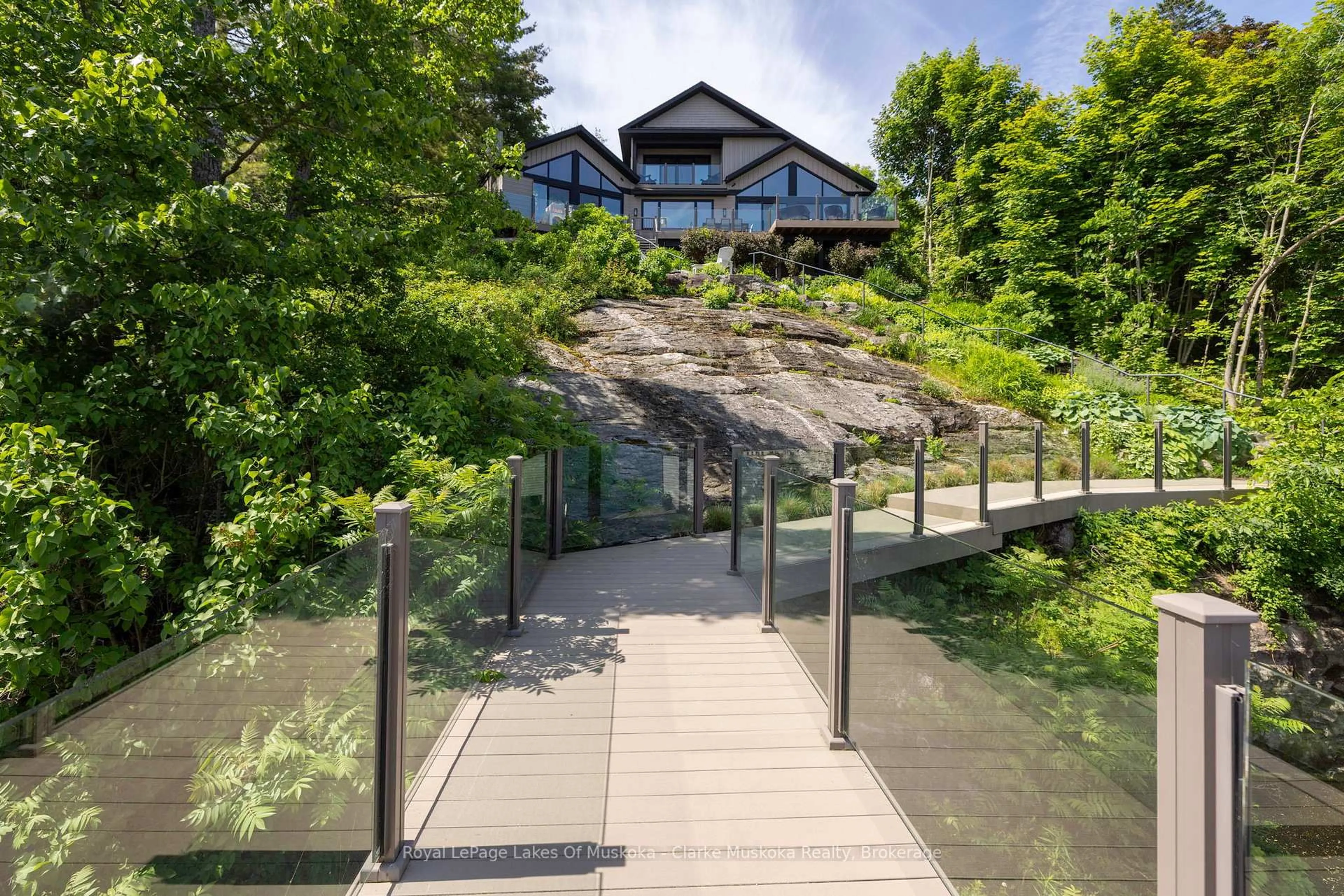 A pic from outside/outdoor area/front of a property/back of a property/a pic from drone, mountain view for 305 Wapaska Cres, Gravenhurst Ontario P1P 0E9