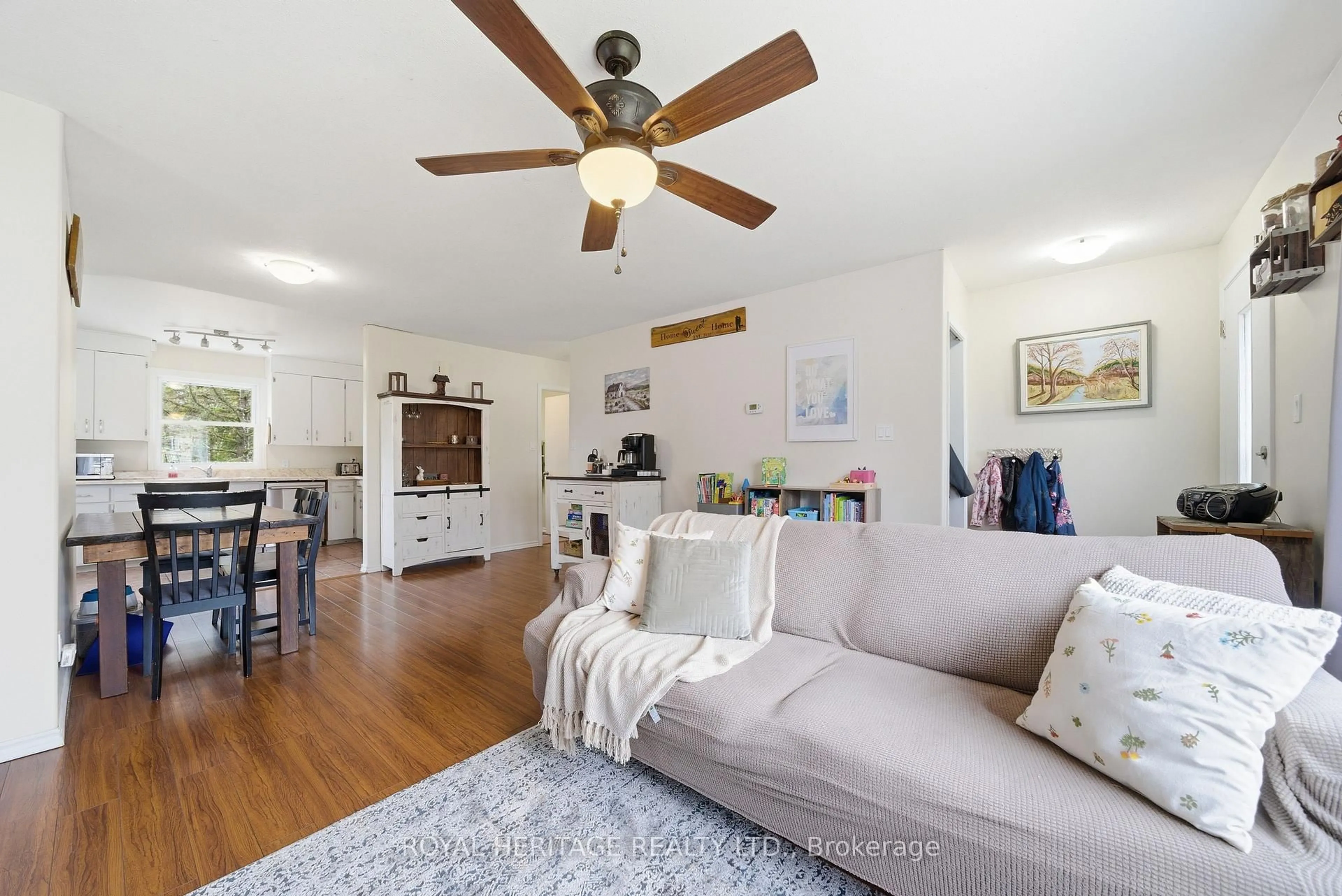 Living room with furniture, wood/laminate floor for 15 Kidd Ave, Quinte West Ontario K8V 2C6