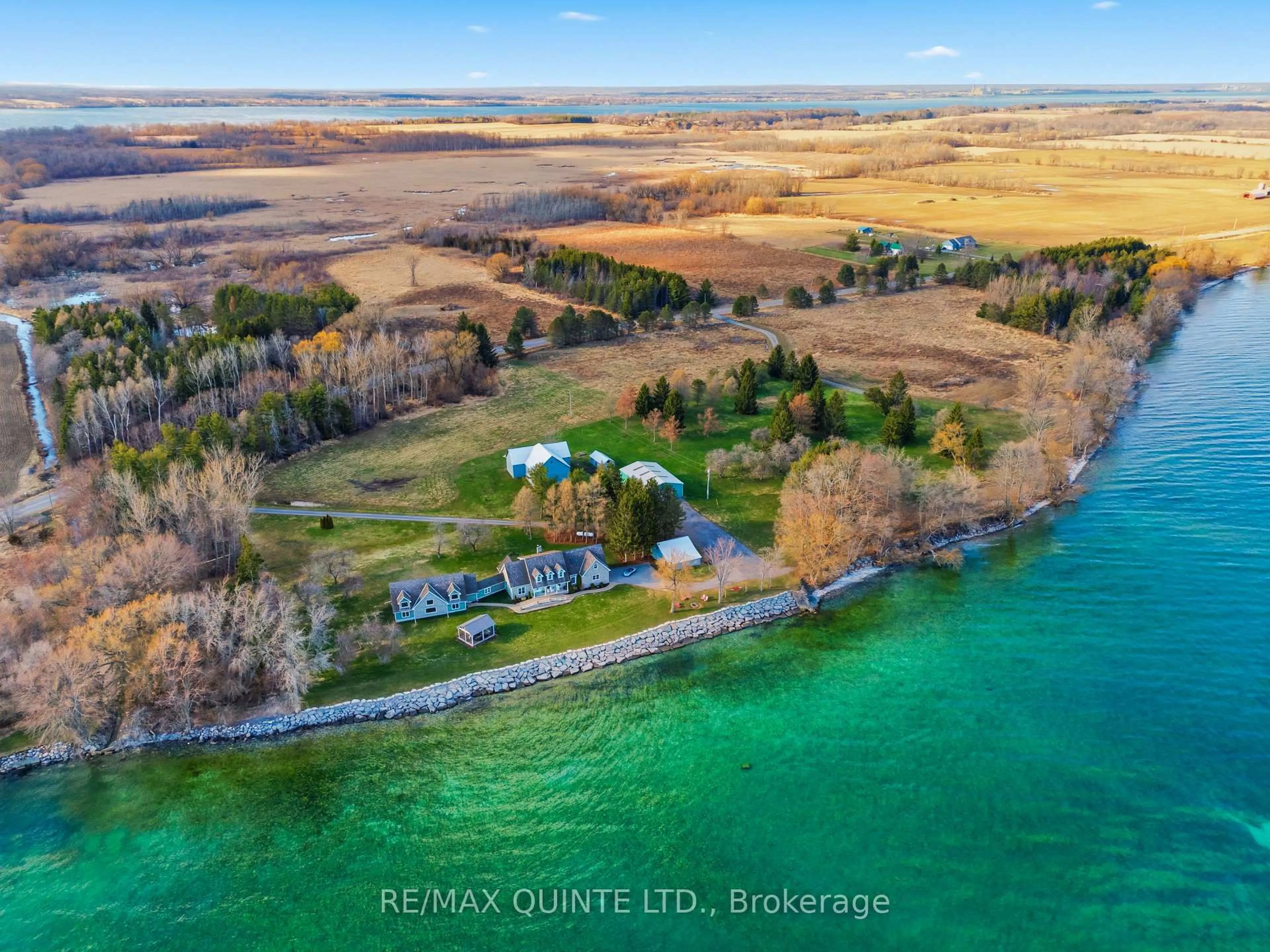 A pic from outside/outdoor area/front of a property/back of a property/a pic from drone, water/lake/river/ocean view for 4698 County Road 8, Prince Edward County Ontario K0K 2T0