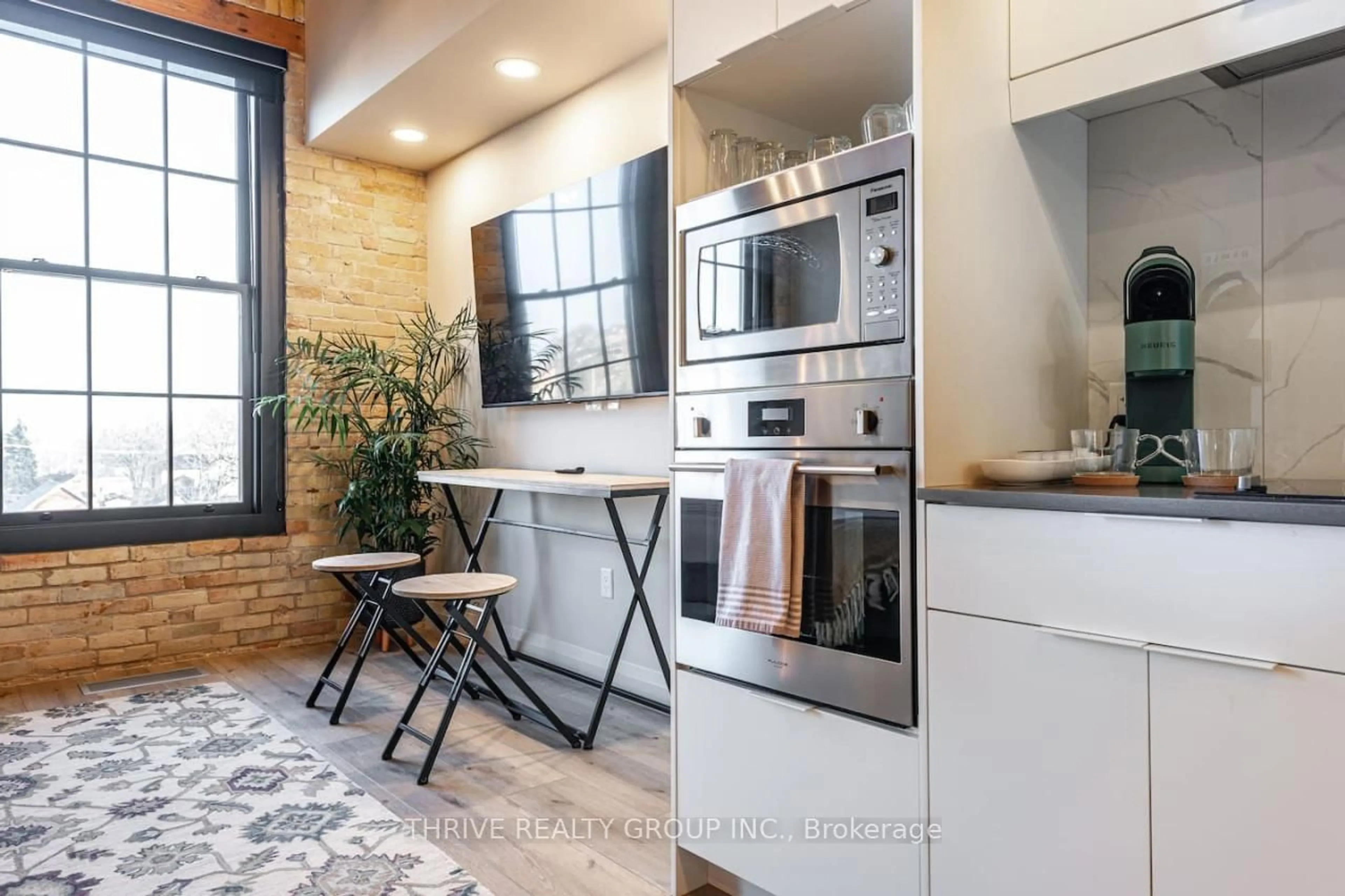 Contemporary kitchen, ceramic/tile floor for 245 Downie St #304, Stratford Ontario N5A 1X5