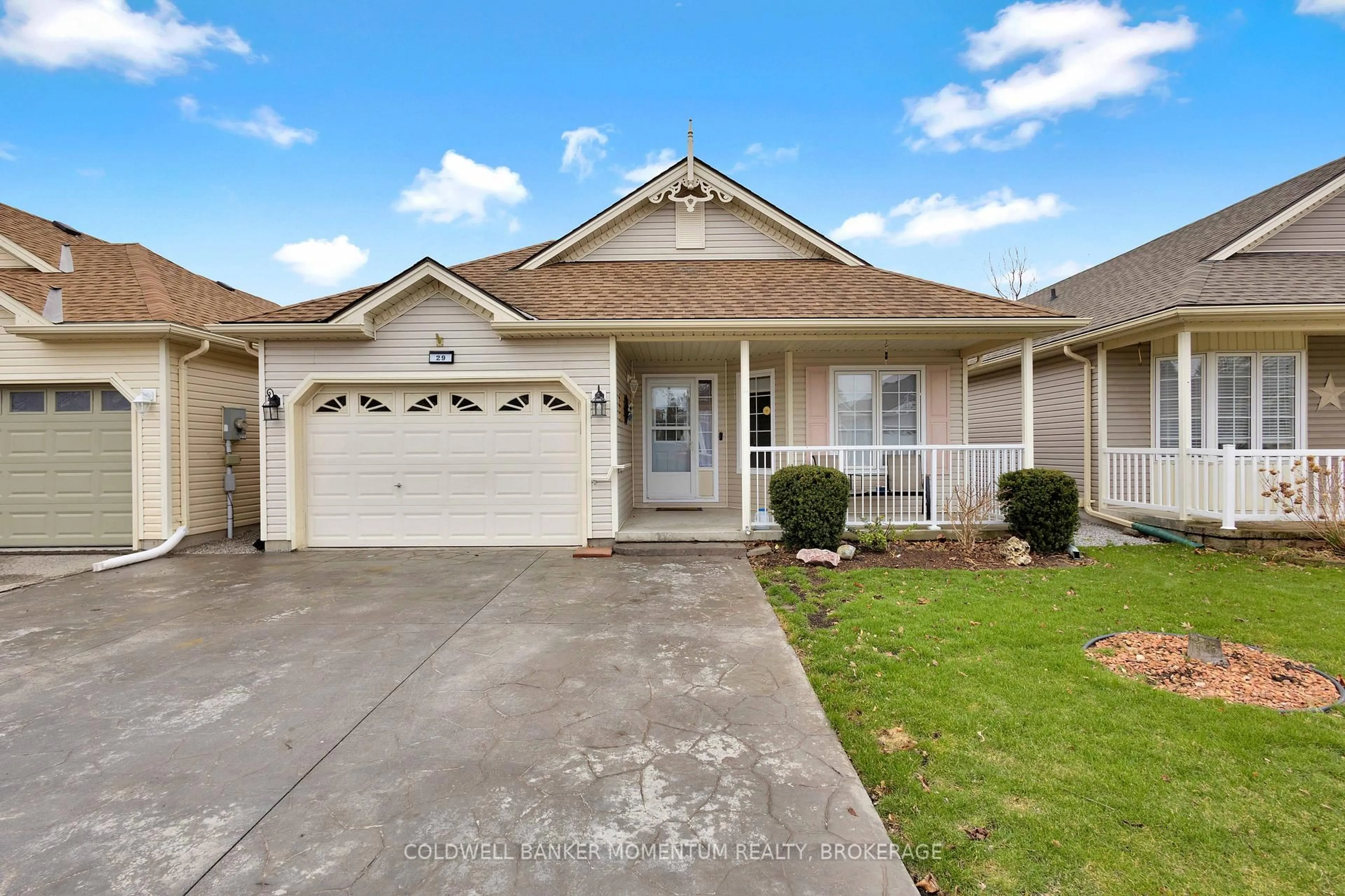 Home with vinyl exterior material, street for 29 Balsam Tr, Norfolk Ontario N0E 1P0