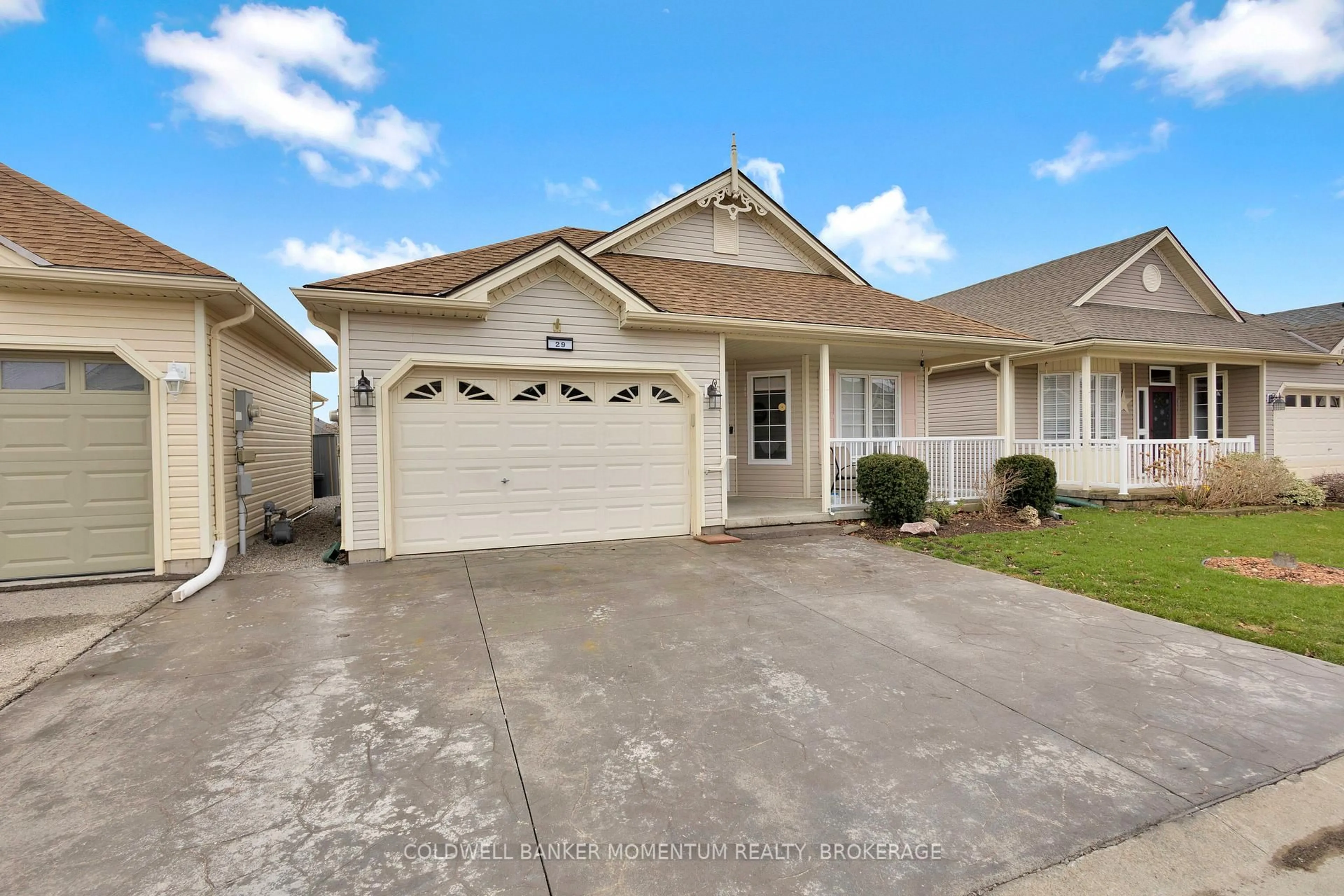 Home with vinyl exterior material, street for 29 Balsam Tr, Norfolk Ontario N0E 1P0