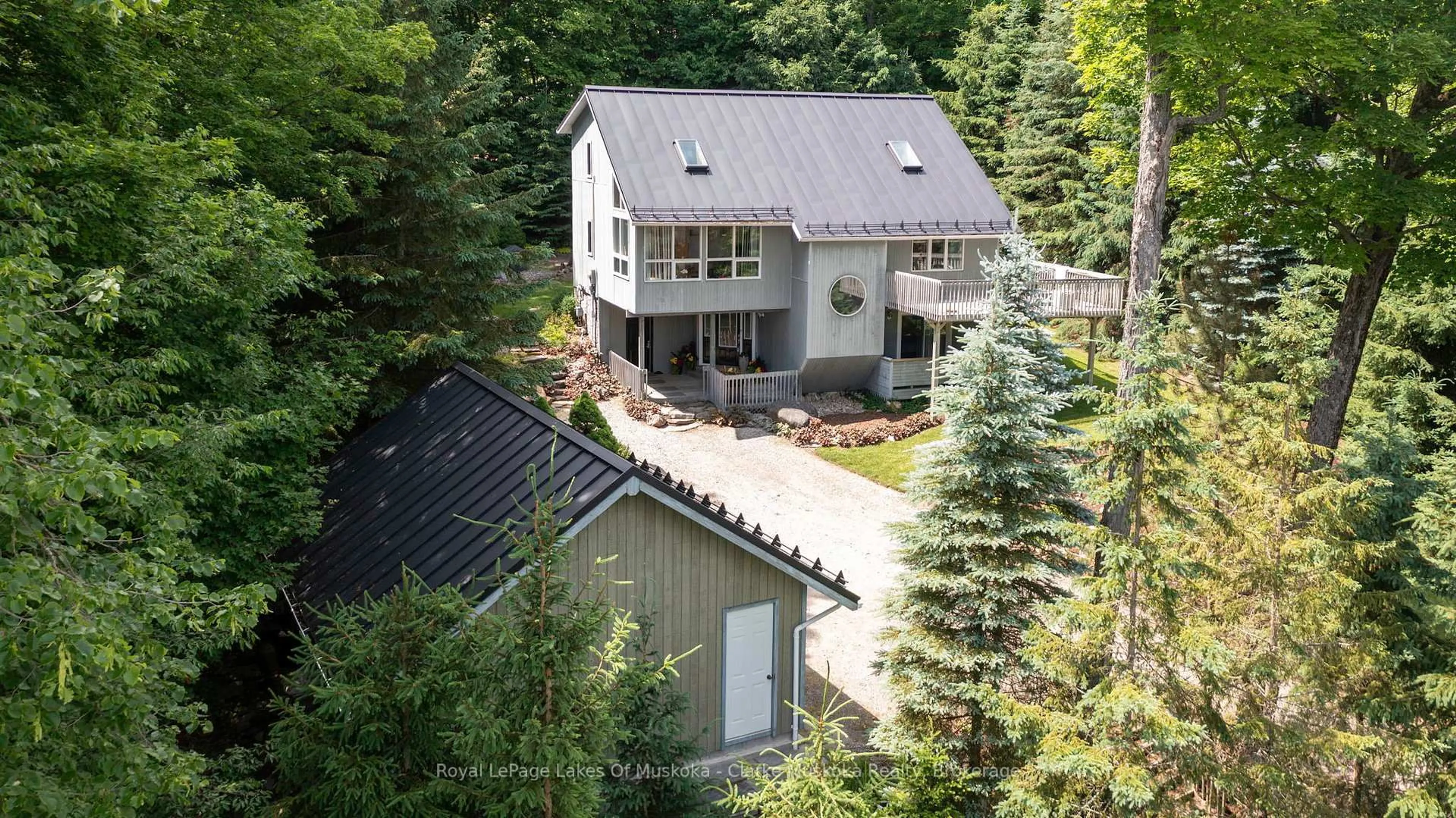 A pic from outside/outdoor area/front of a property/back of a property/a pic from drone, unknown for 1806 Valley Rd, Huntsville Ontario P1H 1A8