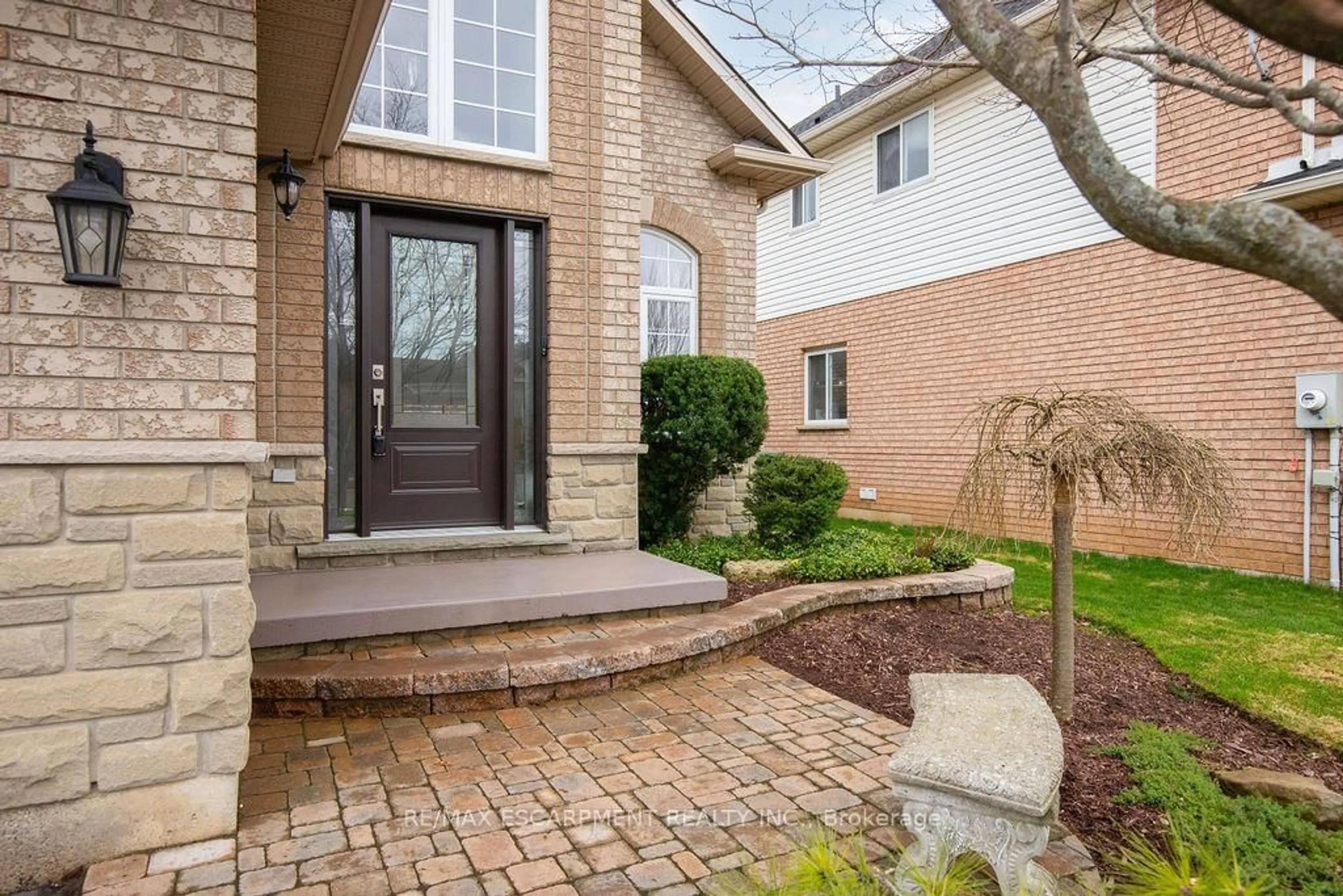 Home with brick exterior material, street for 154 Thoroughbred Blvd, Hamilton Ontario L9K 1M9