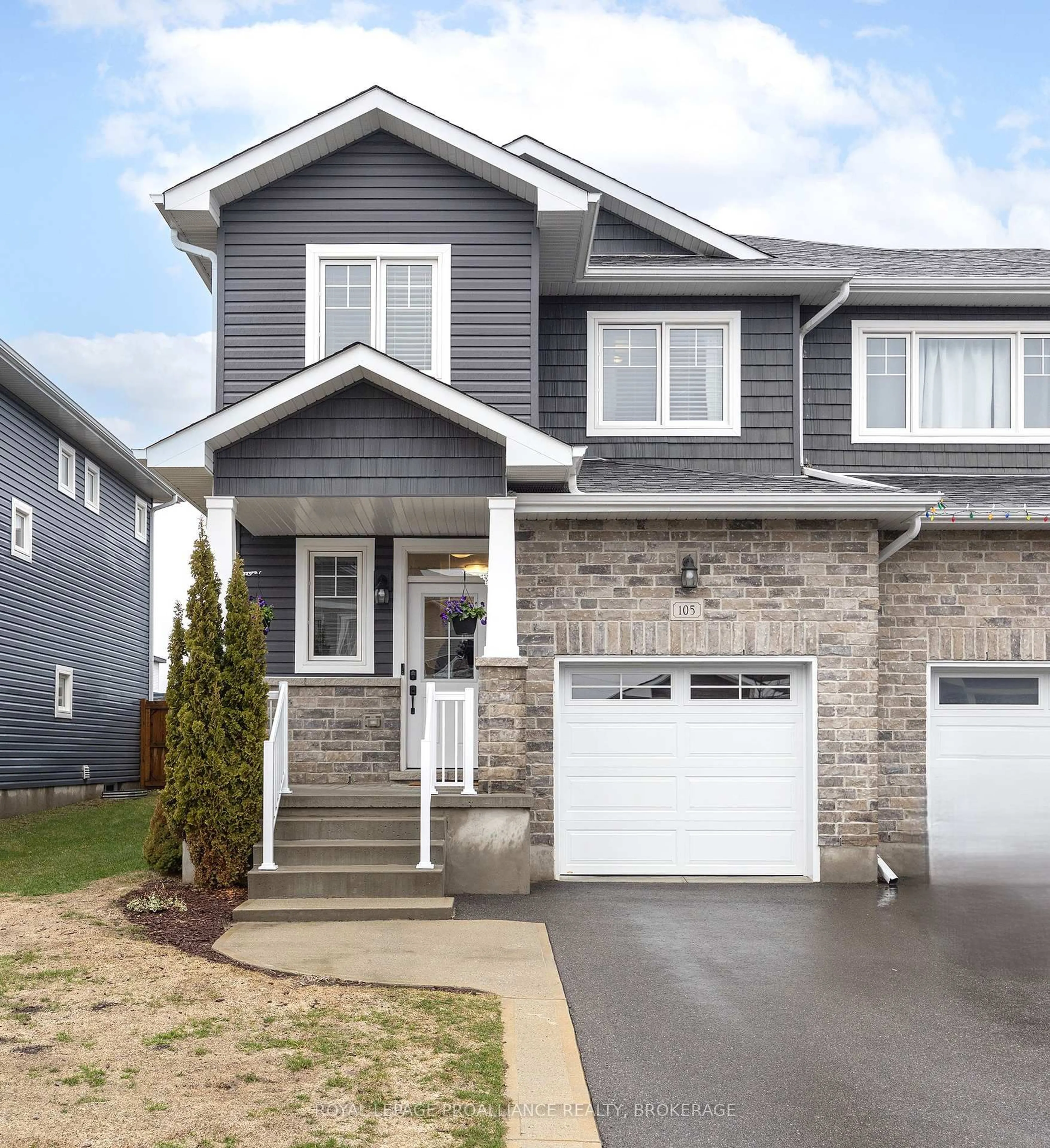 Home with vinyl exterior material, street for 105 Hazlett St, Loyalist Ontario K7N 0C1