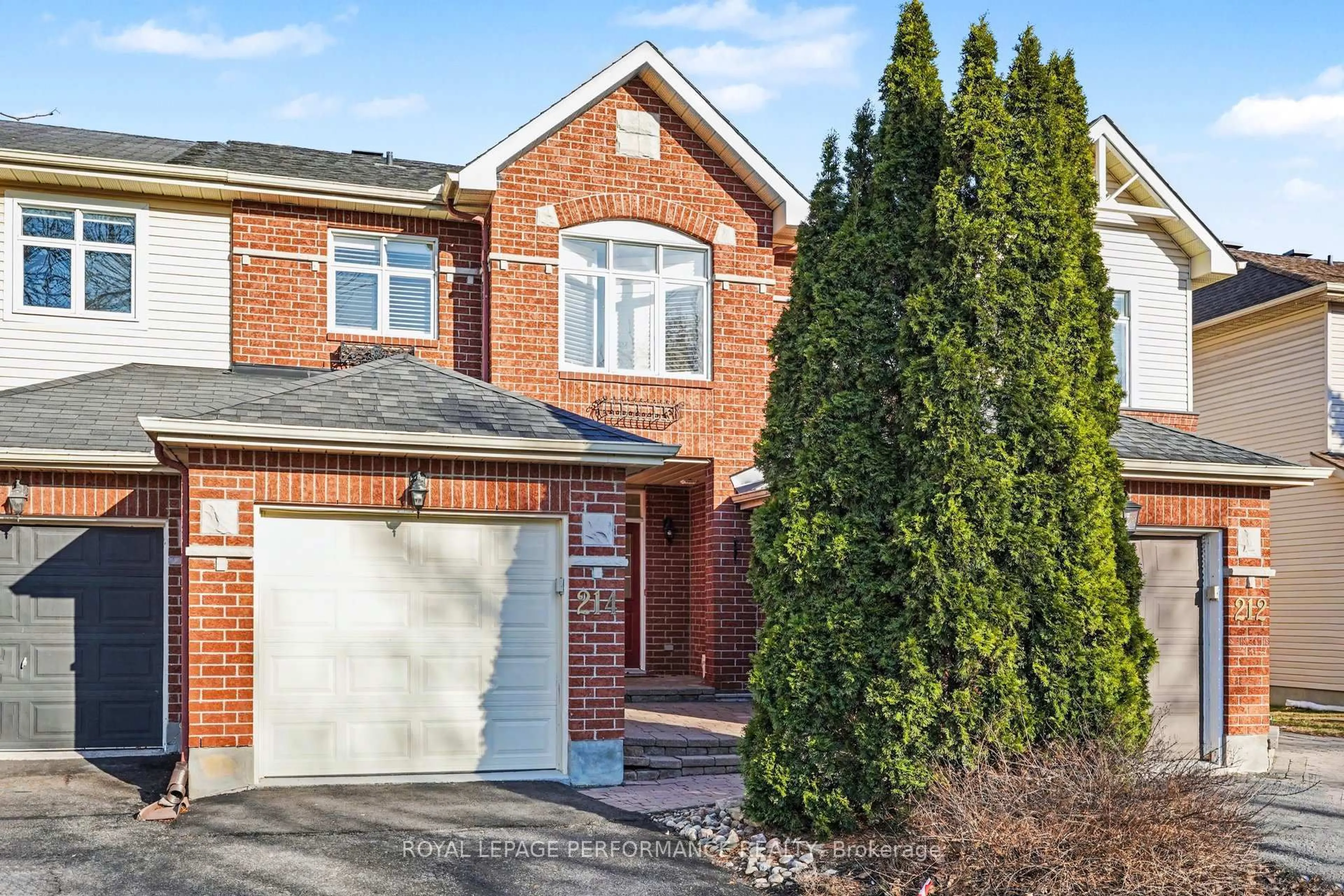 Home with brick exterior material, street for 214 Windhurst Dr, Ottawa Ontario K2G 6H9