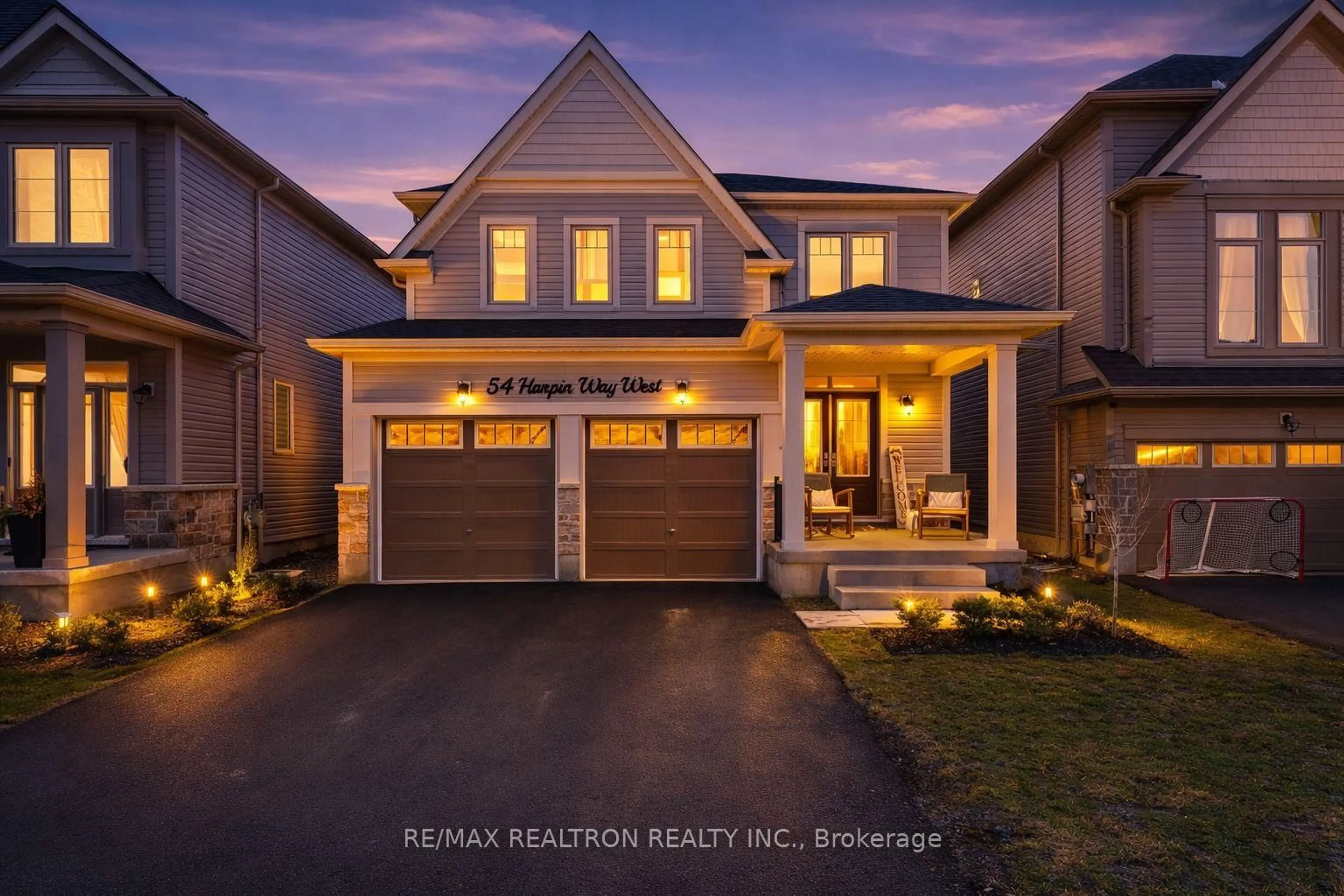 Home with brick exterior material, street for 54 Harpin Way, Centre Wellington Ontario N1M 0H8