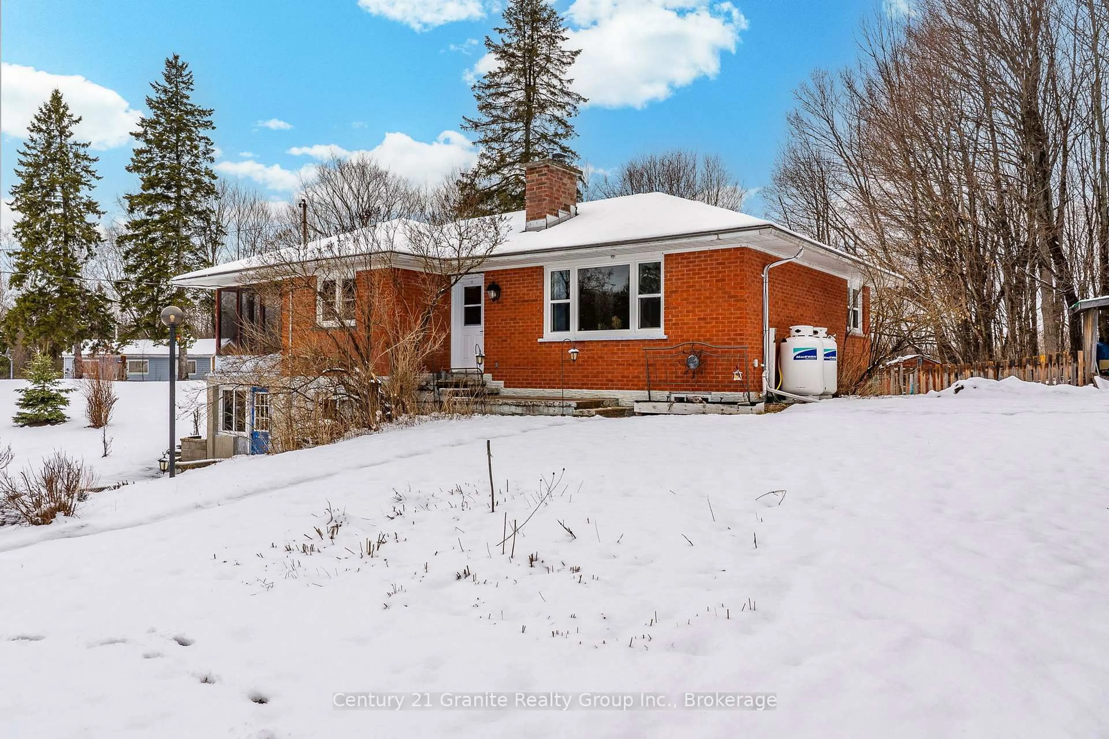 A pic from outside/outdoor area/front of a property/back of a property/a pic from drone, street for 1523 County Road 21 Rd, Minden Hills Ontario K0M 2K0