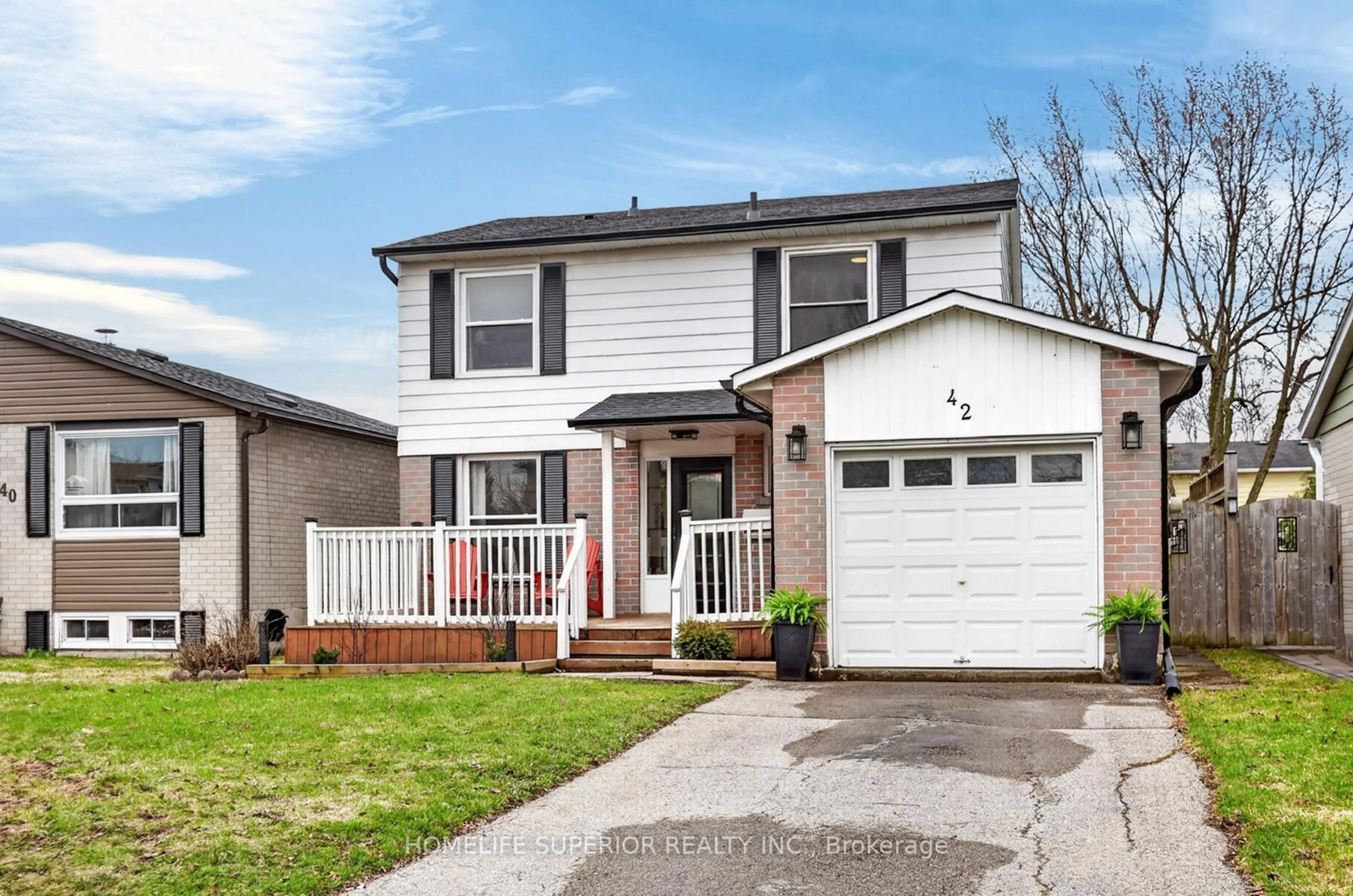 Home with vinyl exterior material, street for 42 Arthur Mark Dr, Port Hope Ontario L1A 3X1