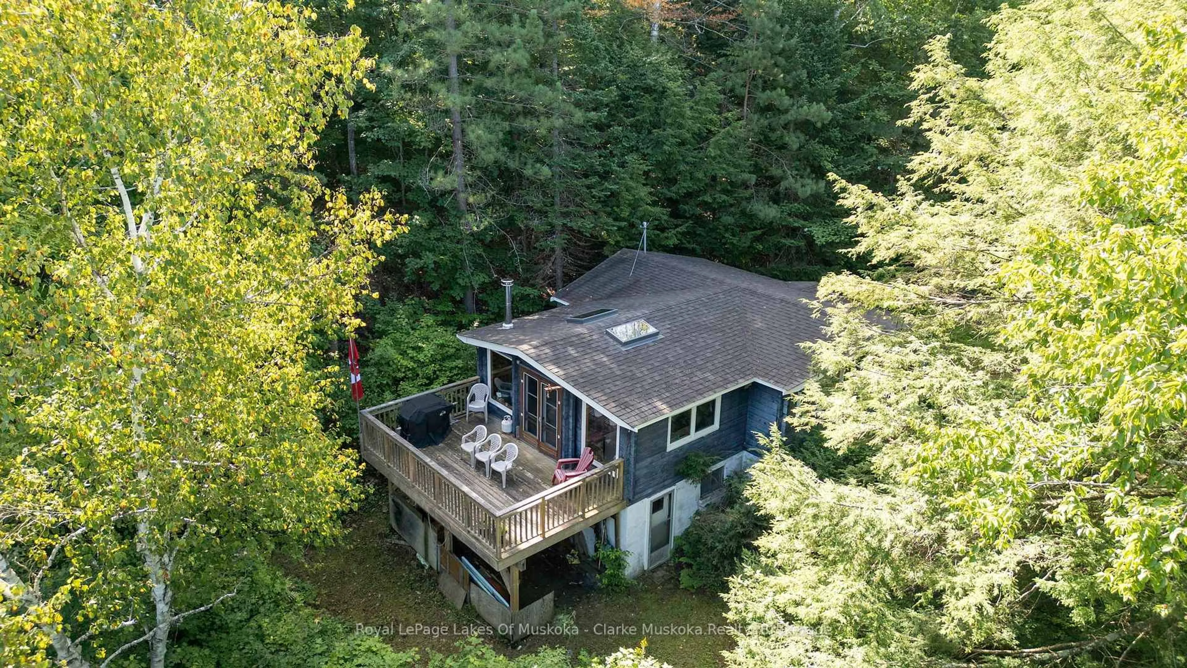 A pic from outside/outdoor area/front of a property/back of a property/a pic from drone, water/lake/river/ocean view for 74 Lioness Rd, Seguin Ontario P2A 2W8